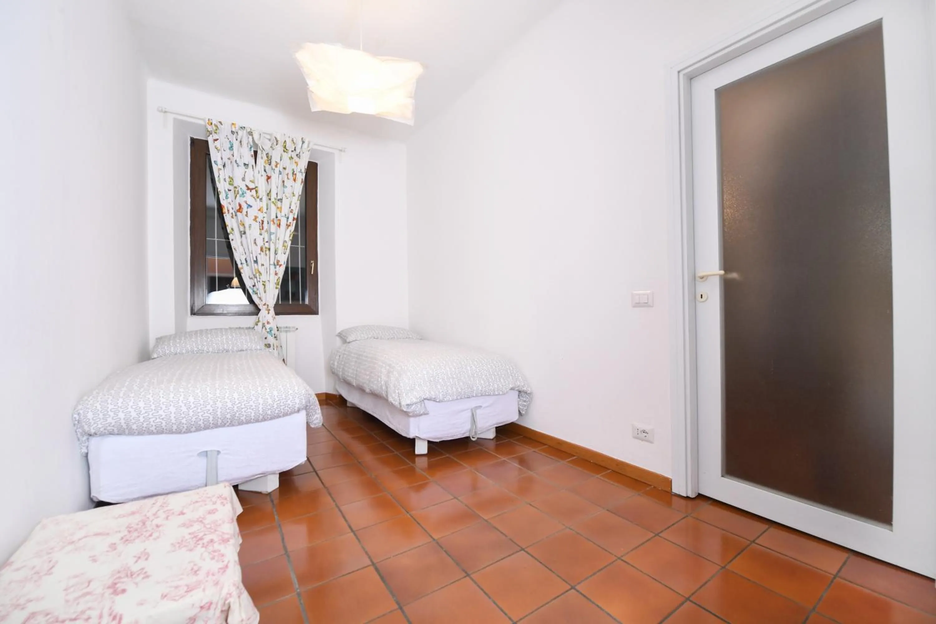 Bedroom in Villa Pinetina B&B