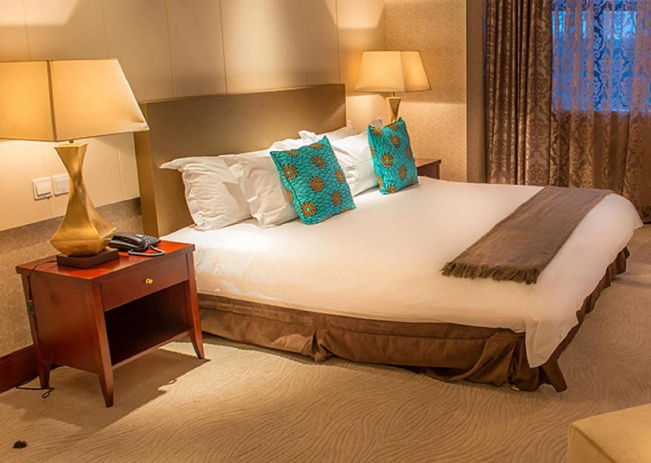 Bed in President Hotel at Umodzi Park