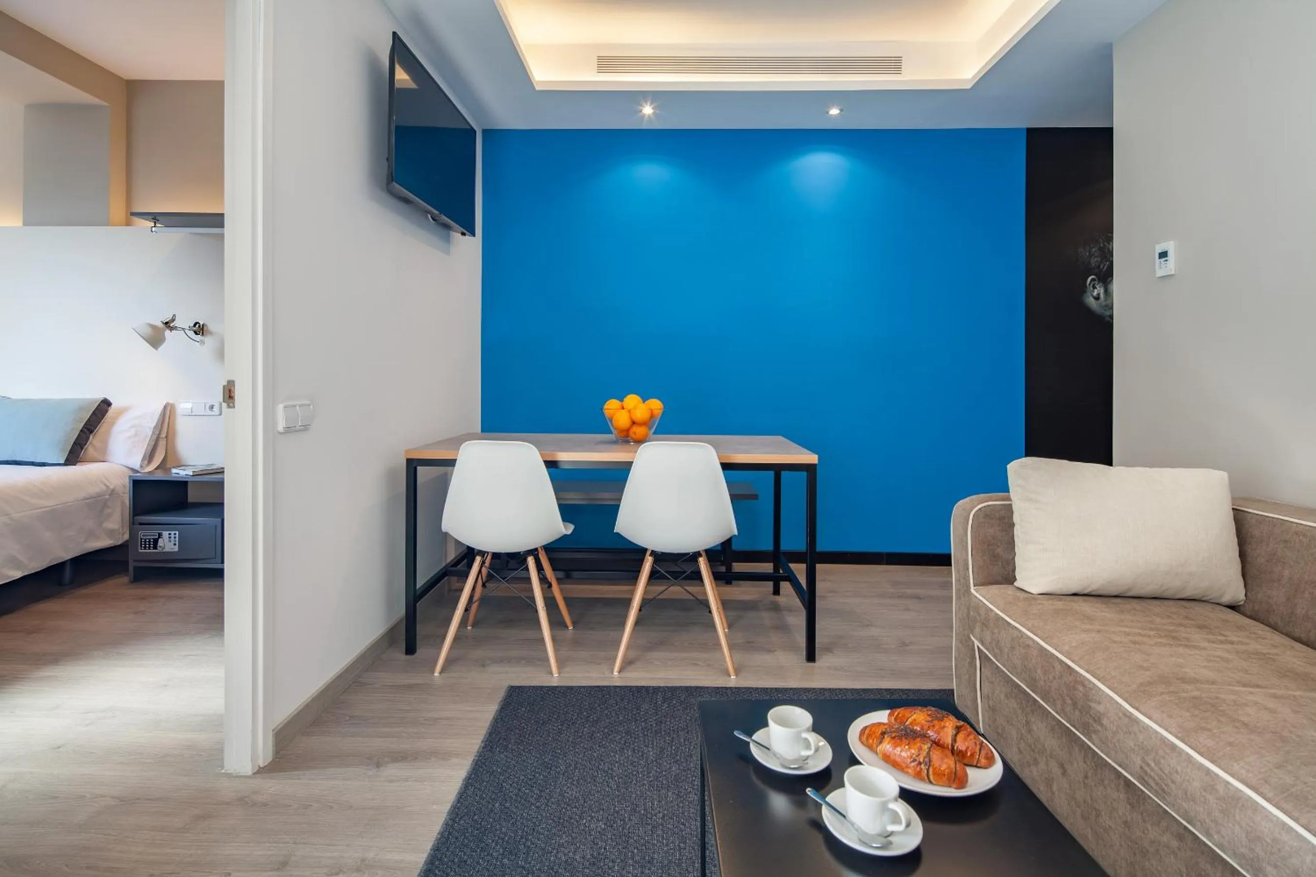 Living room, Bed in Habitat Apartments Cool Jazz