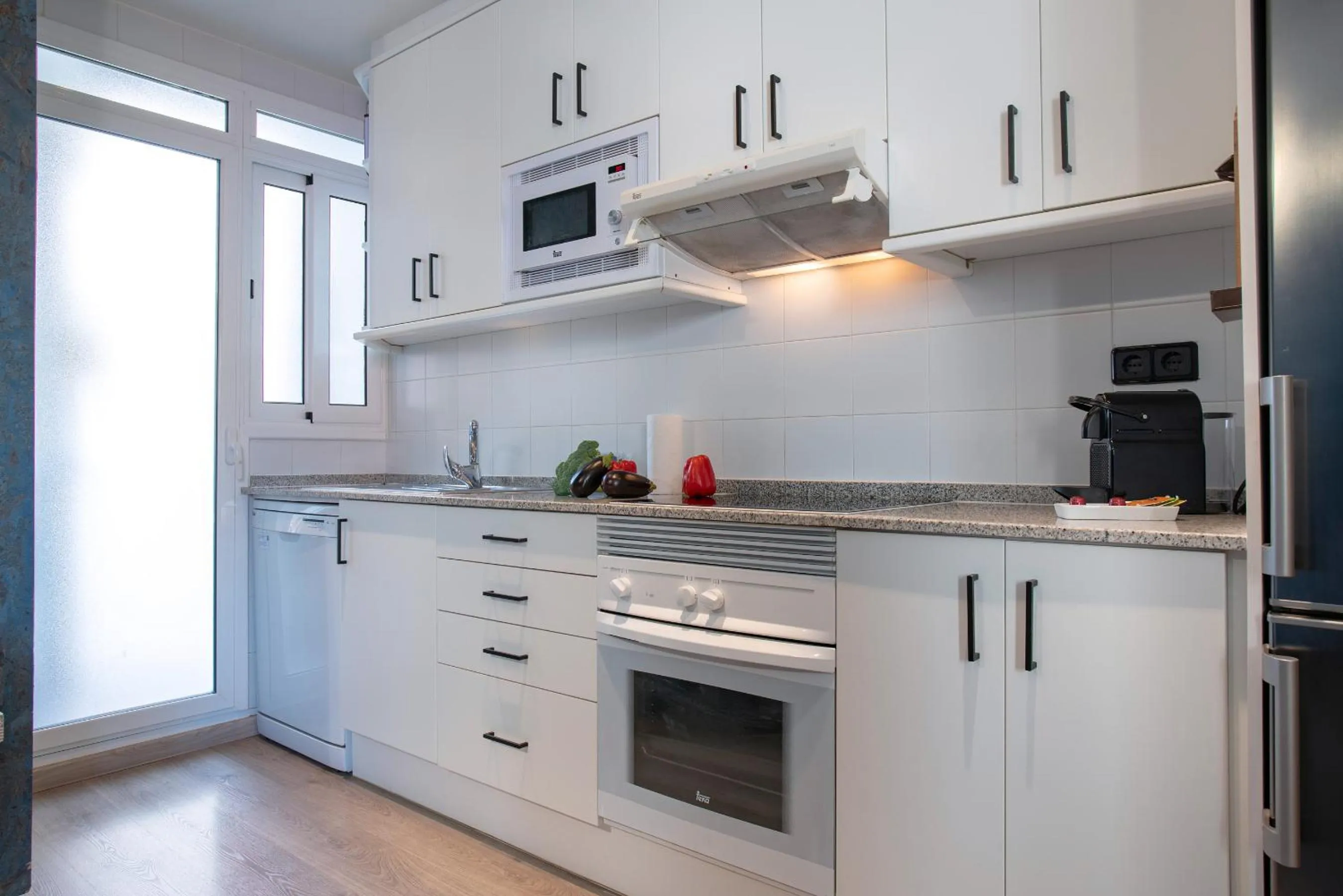 Kitchen or kitchenette in Habitat Apartments Cool Jazz