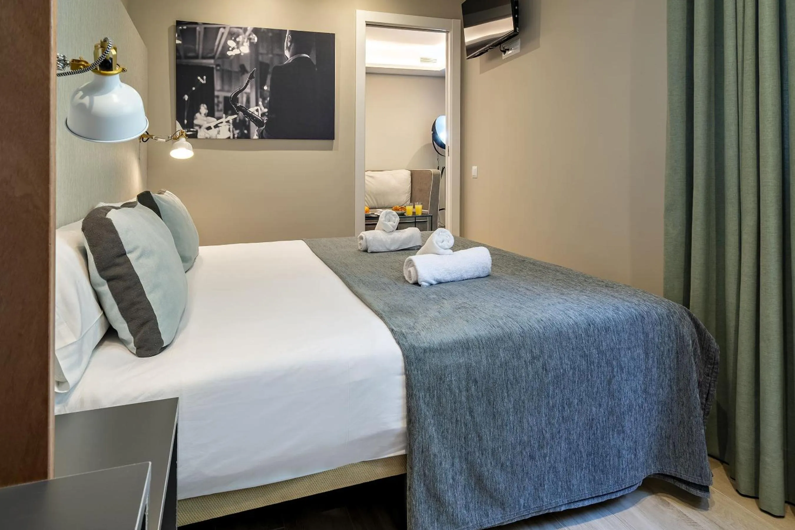 Bedroom, Bed in Habitat Apartments Cool Jazz