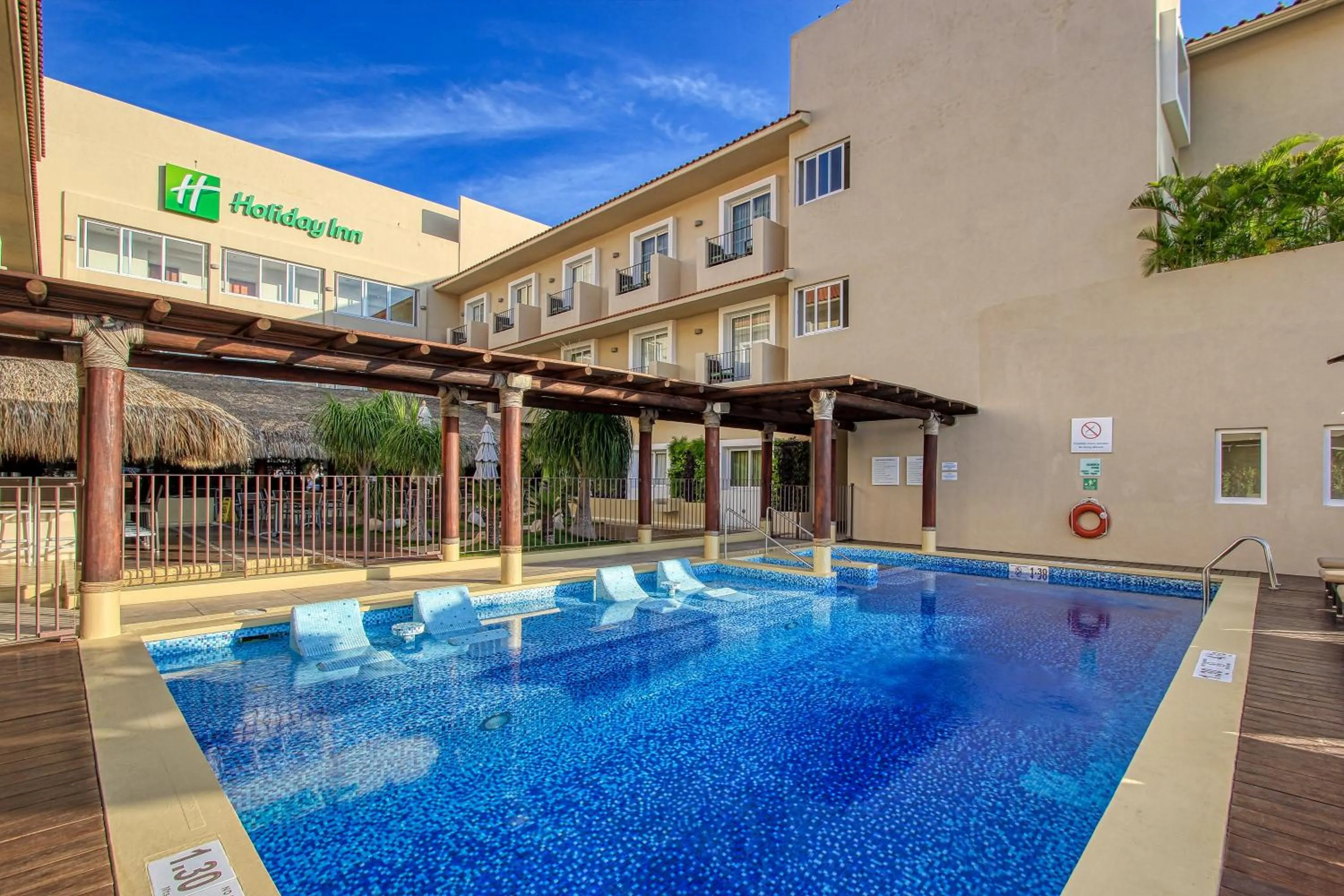 Swimming pool in Holiday Inn Huatulco by IHG