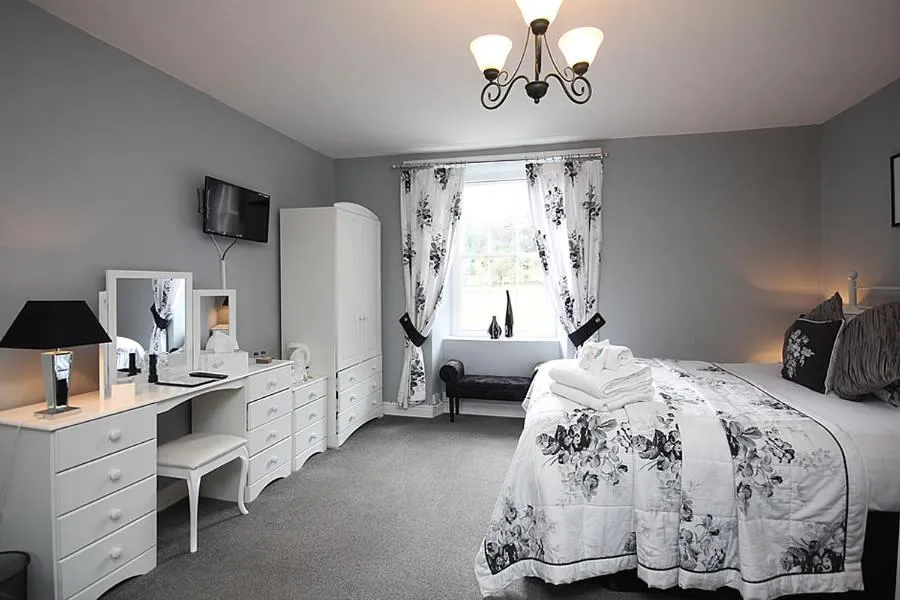 Bed in Dunster Mill House