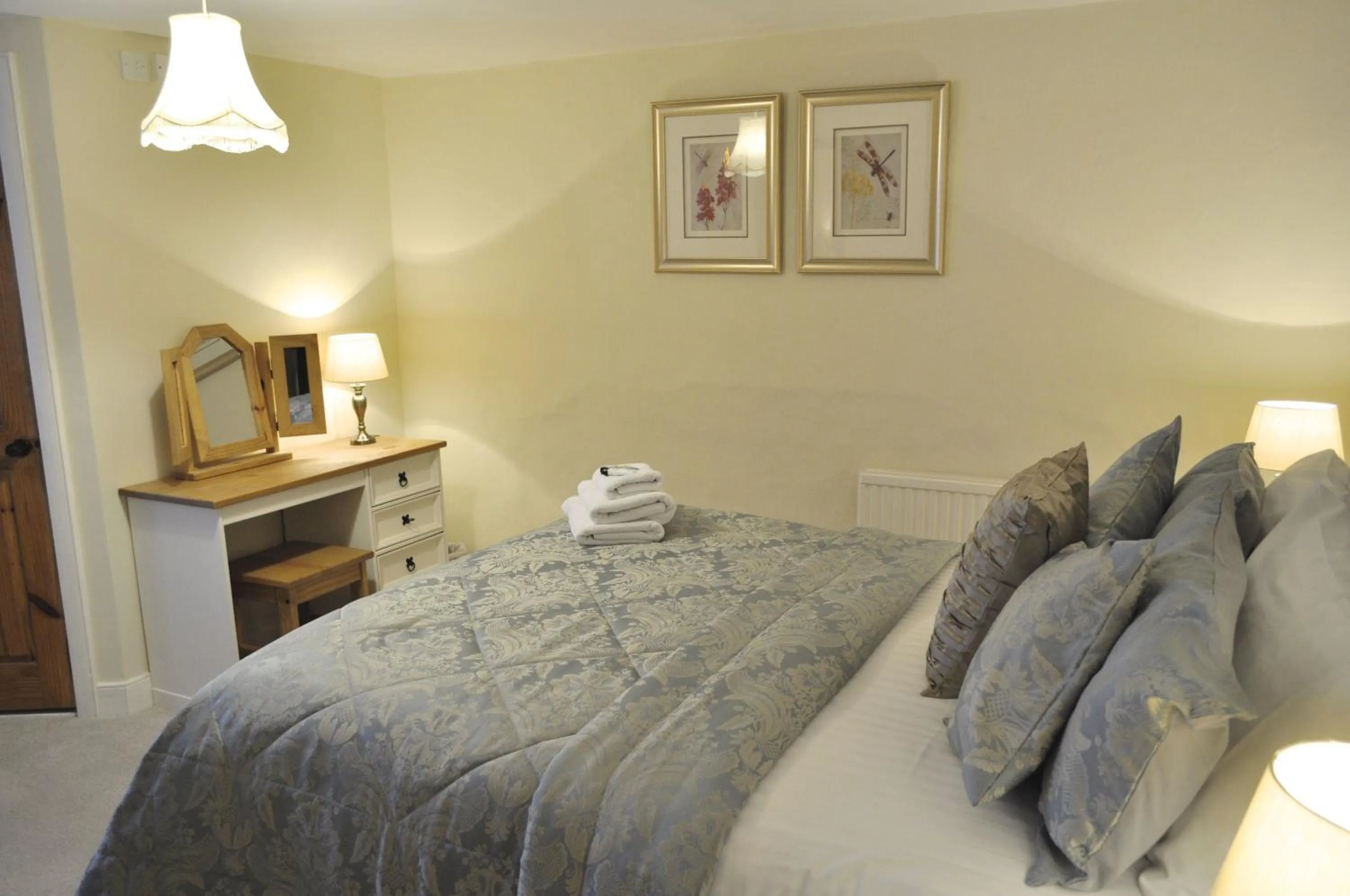 Photo of the whole room, Bed in Dunster Mill House