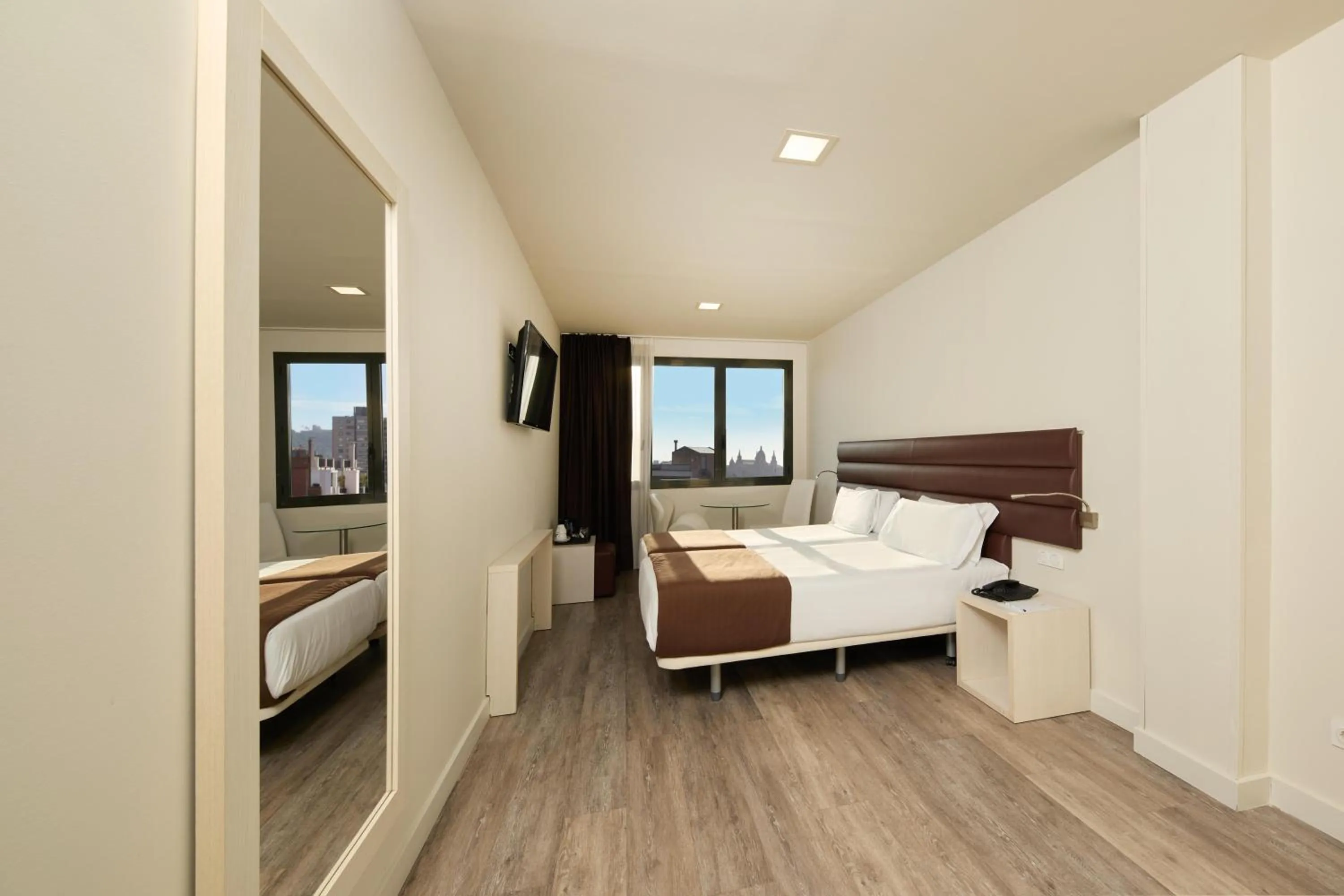 Photo of the whole room, Bed in 1881 Barcelona Rosellón Hotel