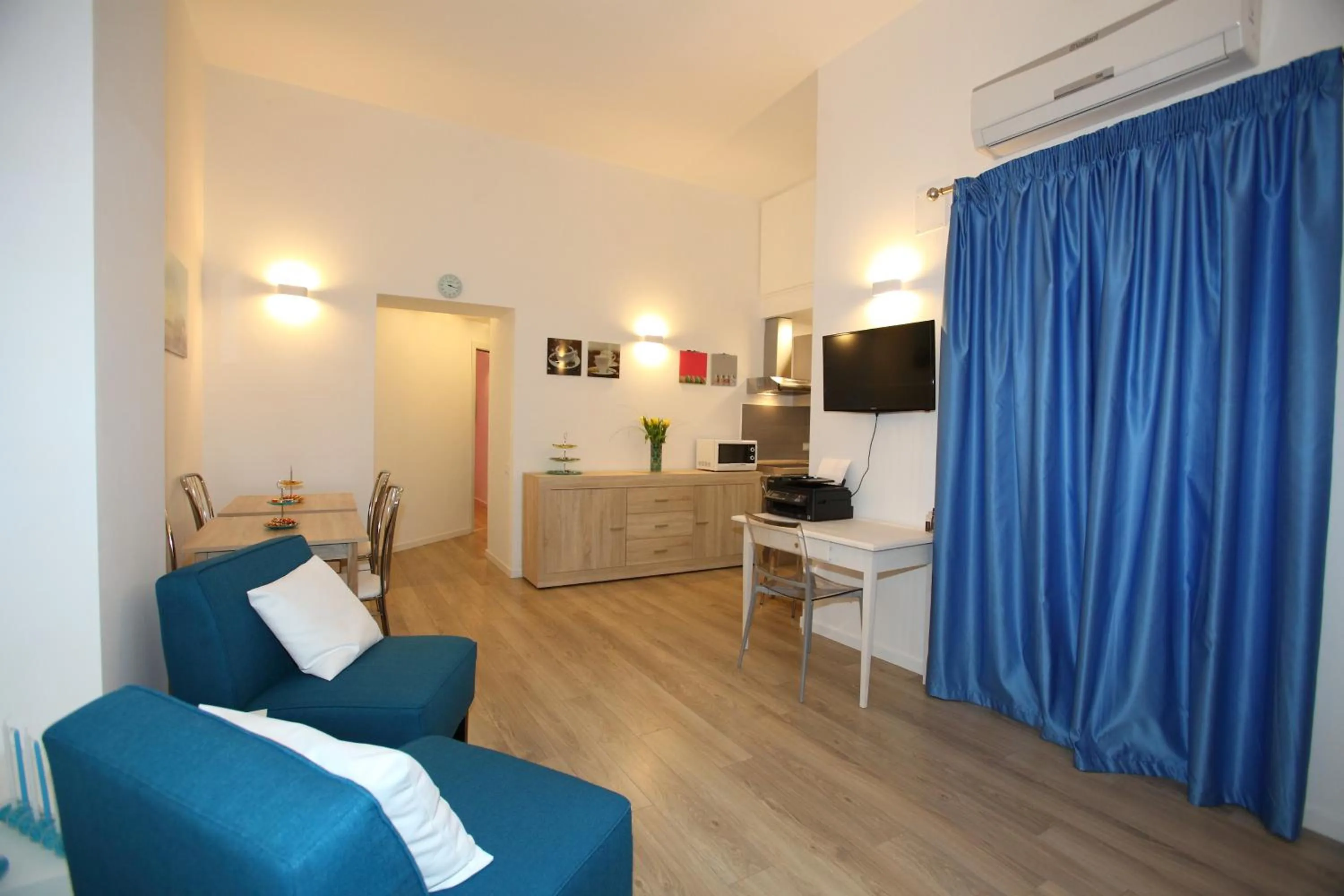 Communal lounge/ TV room in B&B Teatro