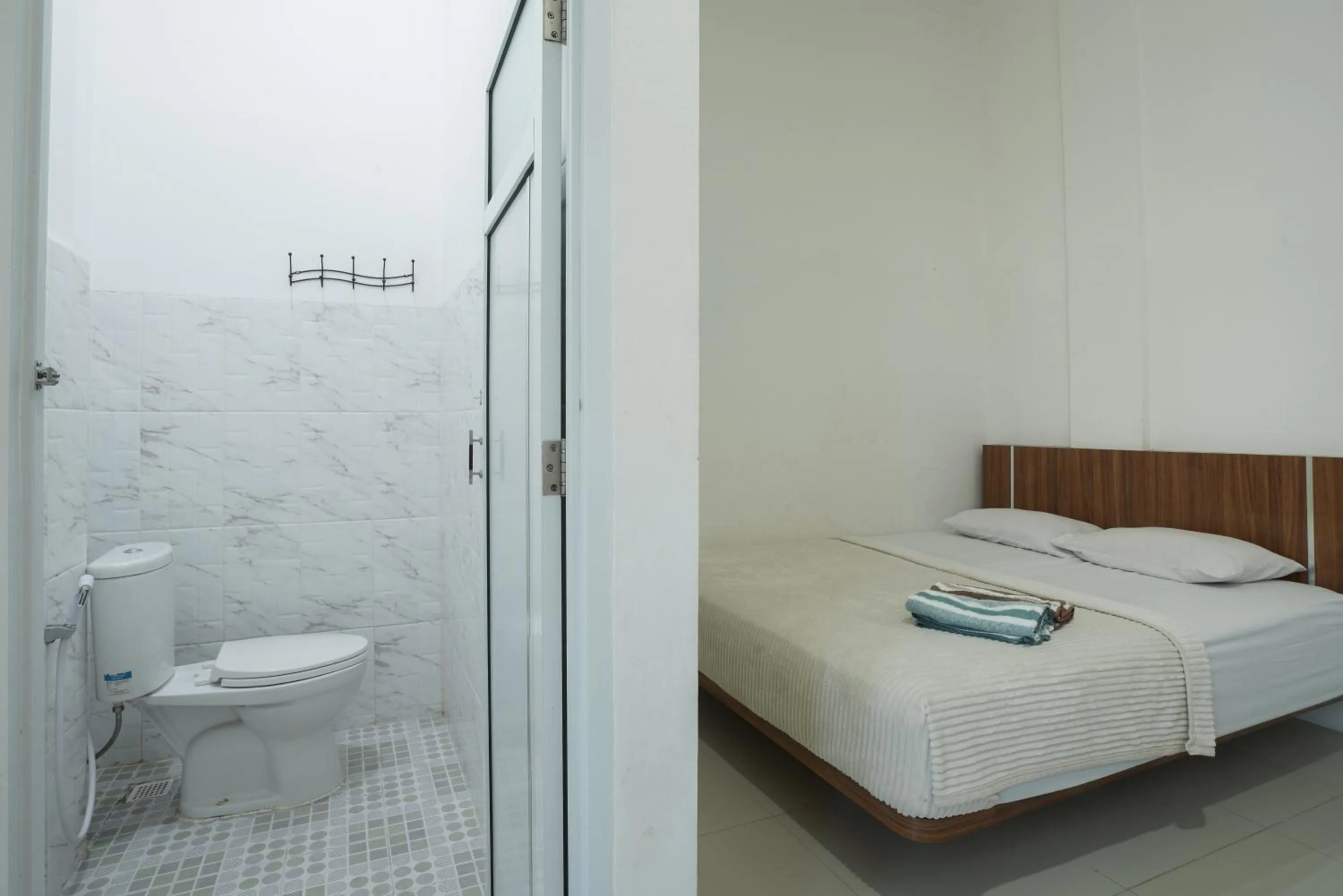 Bed in Sakura Guesthouse & Spa