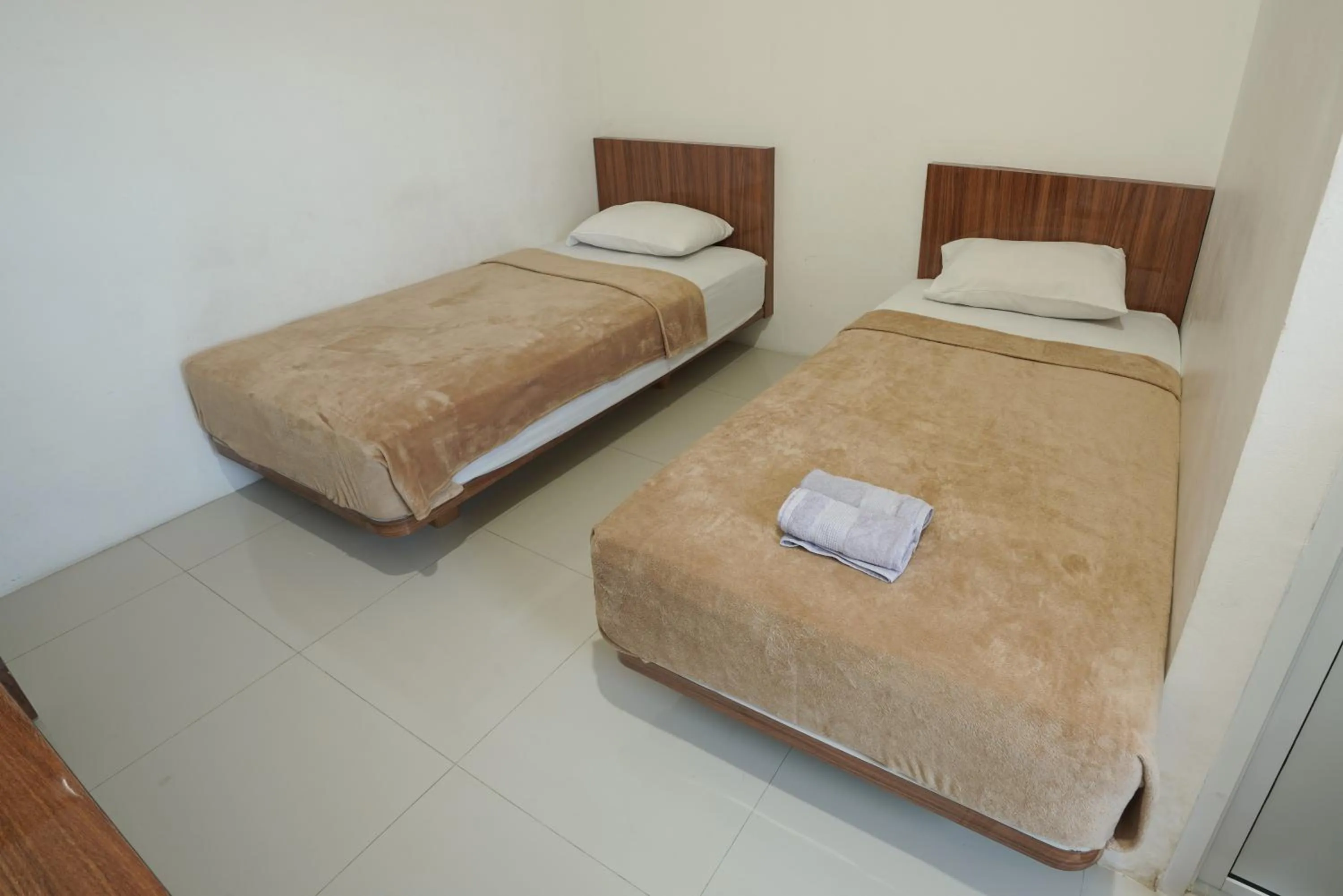 Bed in Sakura Guesthouse & Spa