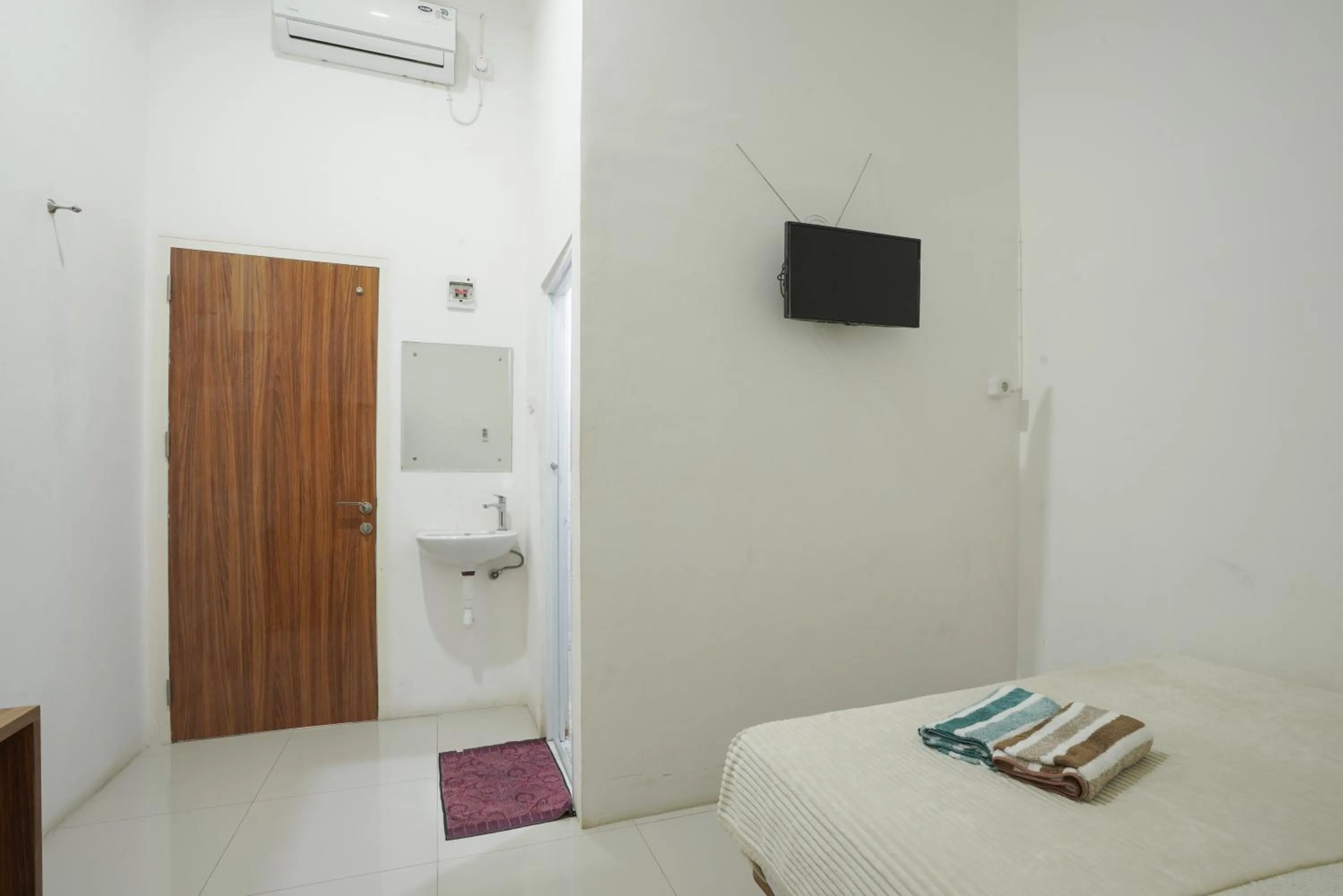 Bed in Sakura Guesthouse & Spa