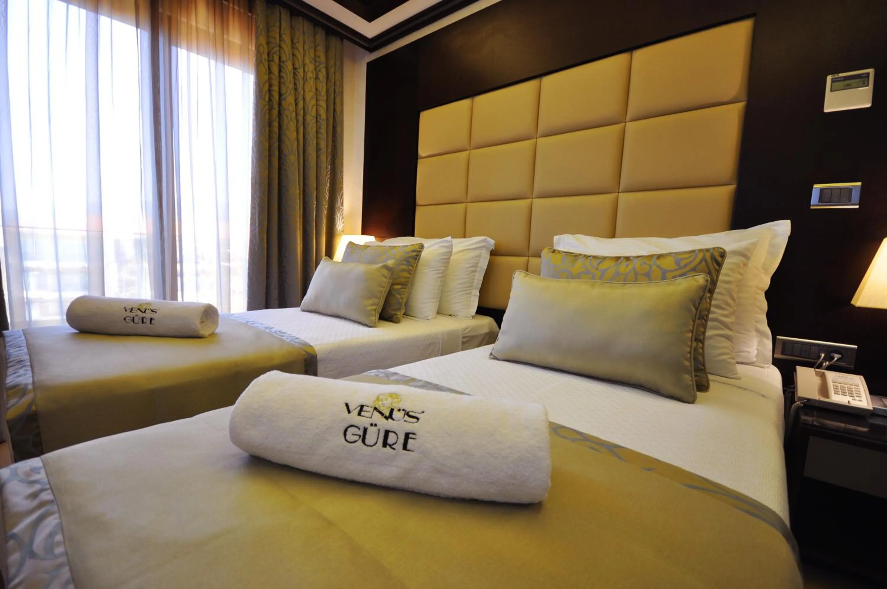 Bed in Venus Thermal Boutique Hotel