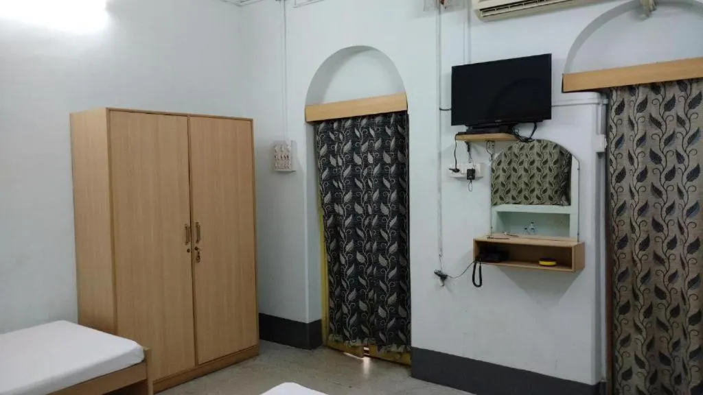 Bed in Shaw Guest House