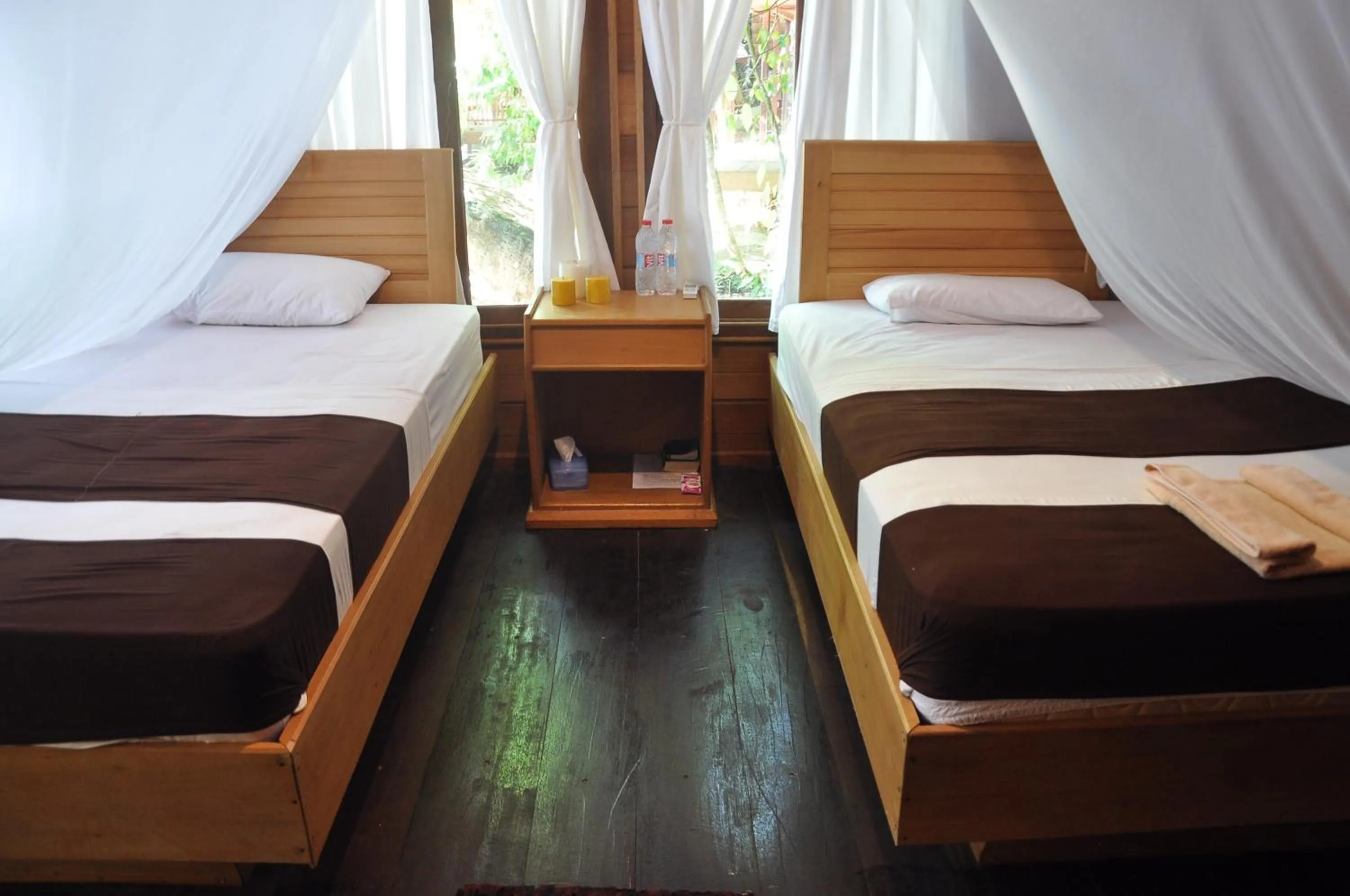 Bed in Raja Ampat Dive Resort