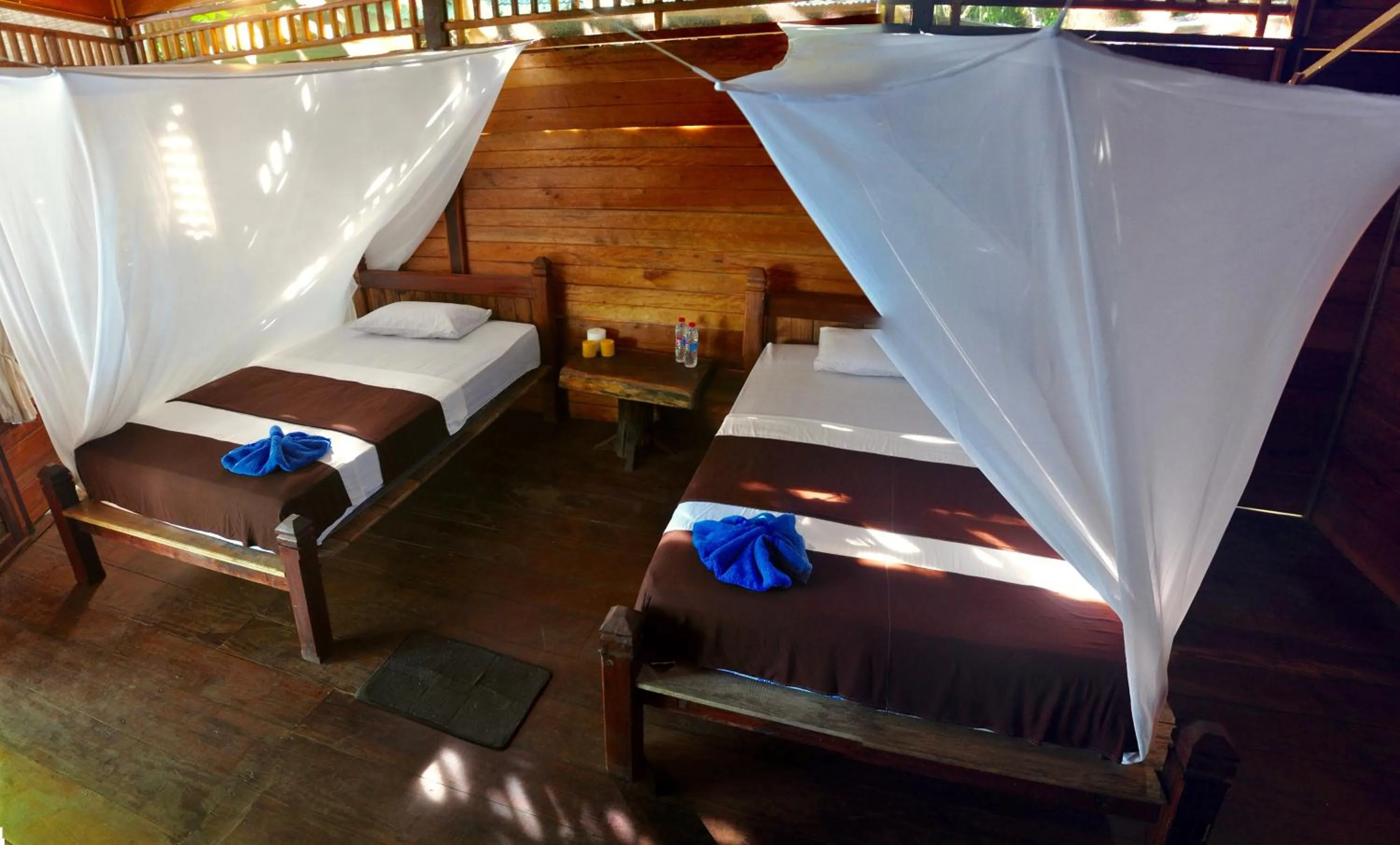 Property building, Bed in Raja Ampat Dive Resort