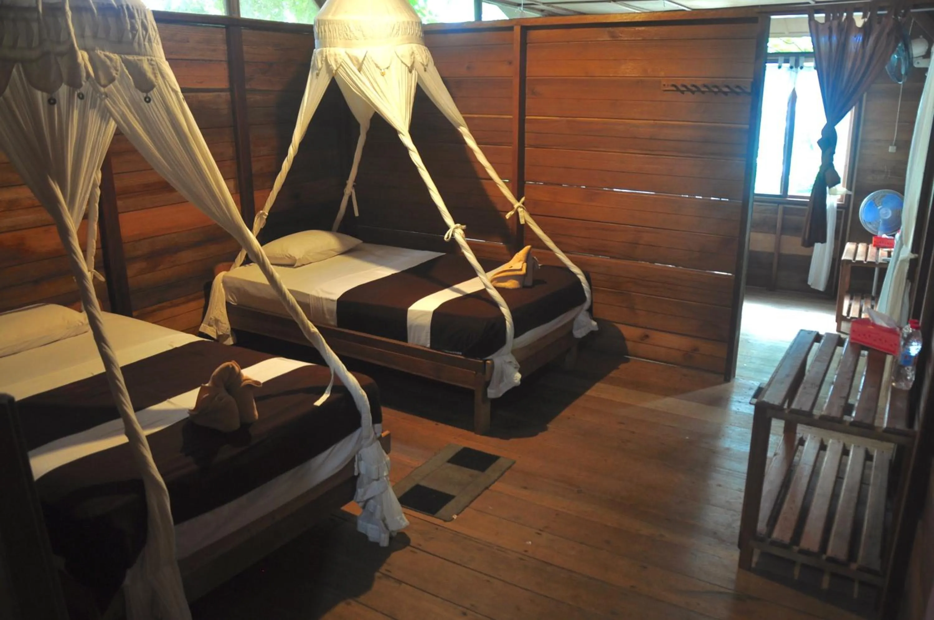 Property building, Bed in Raja Ampat Dive Resort