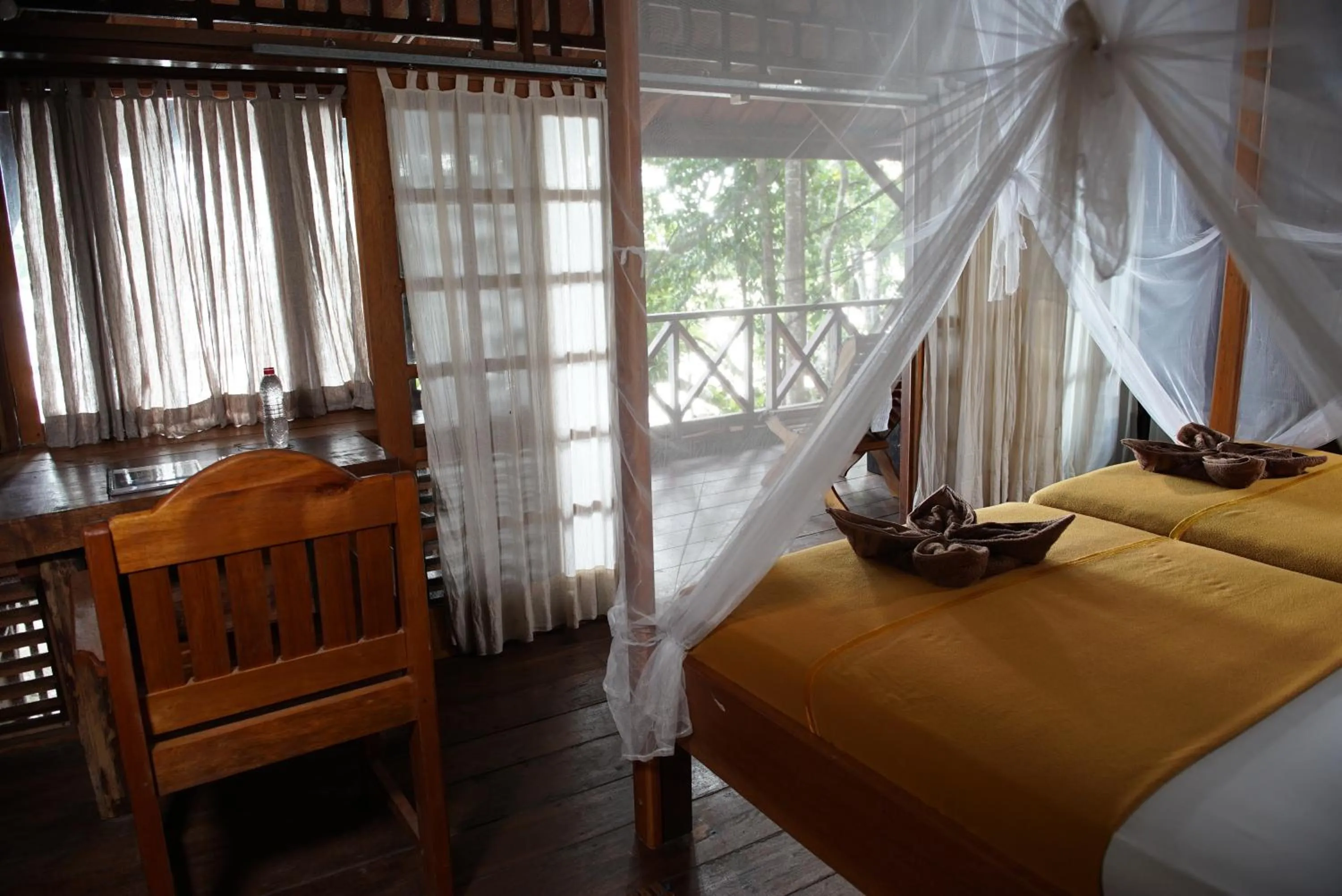 Property building, Bed in Raja Ampat Dive Resort