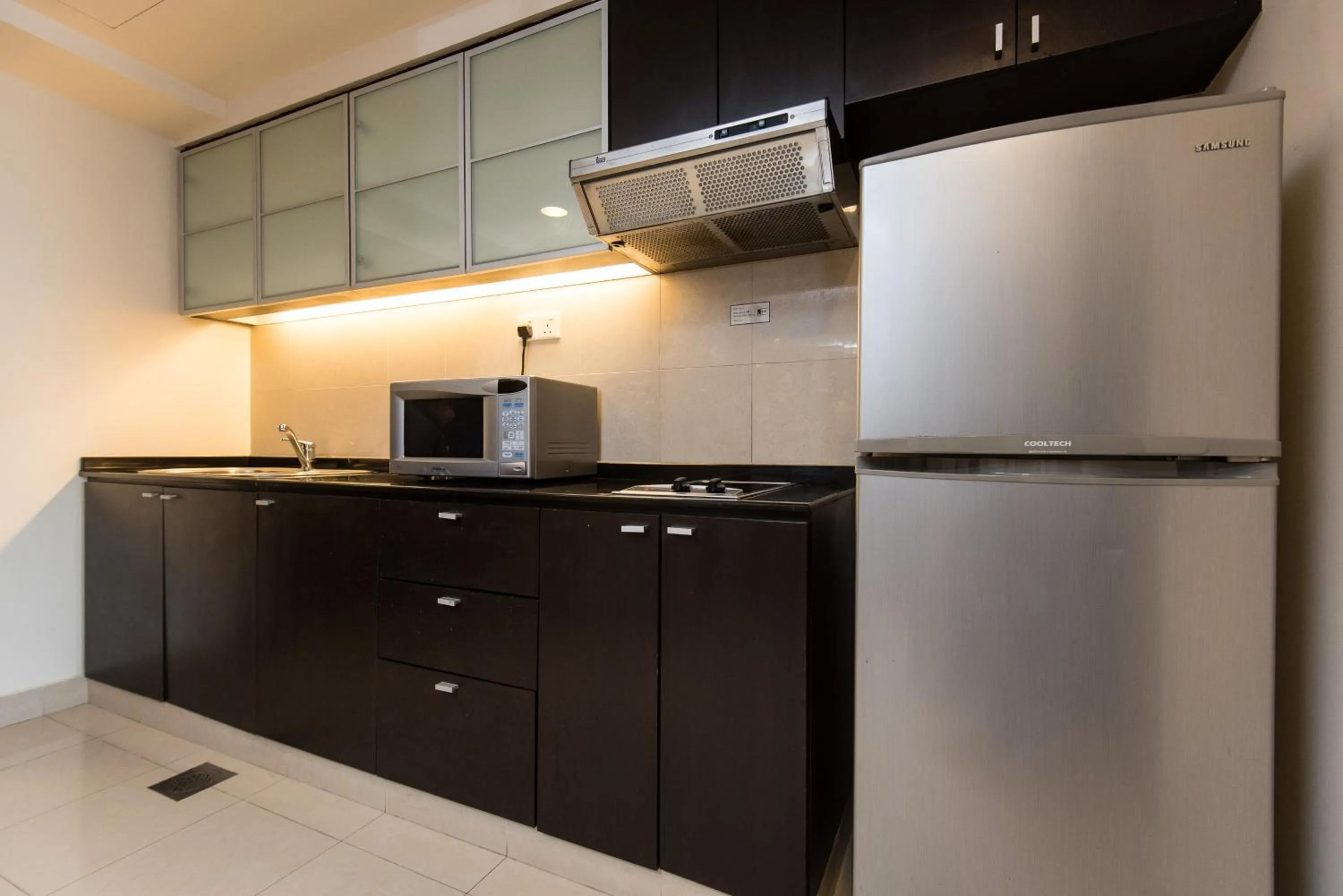 Kitchen or kitchenette in Resort Suites at Bandar Sunway