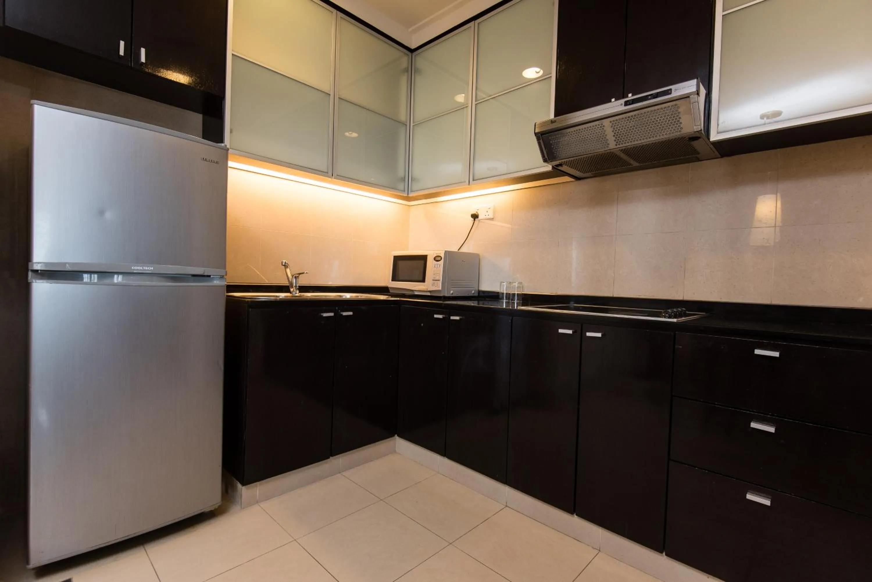 Kitchen or kitchenette in Resort Suites at Bandar Sunway