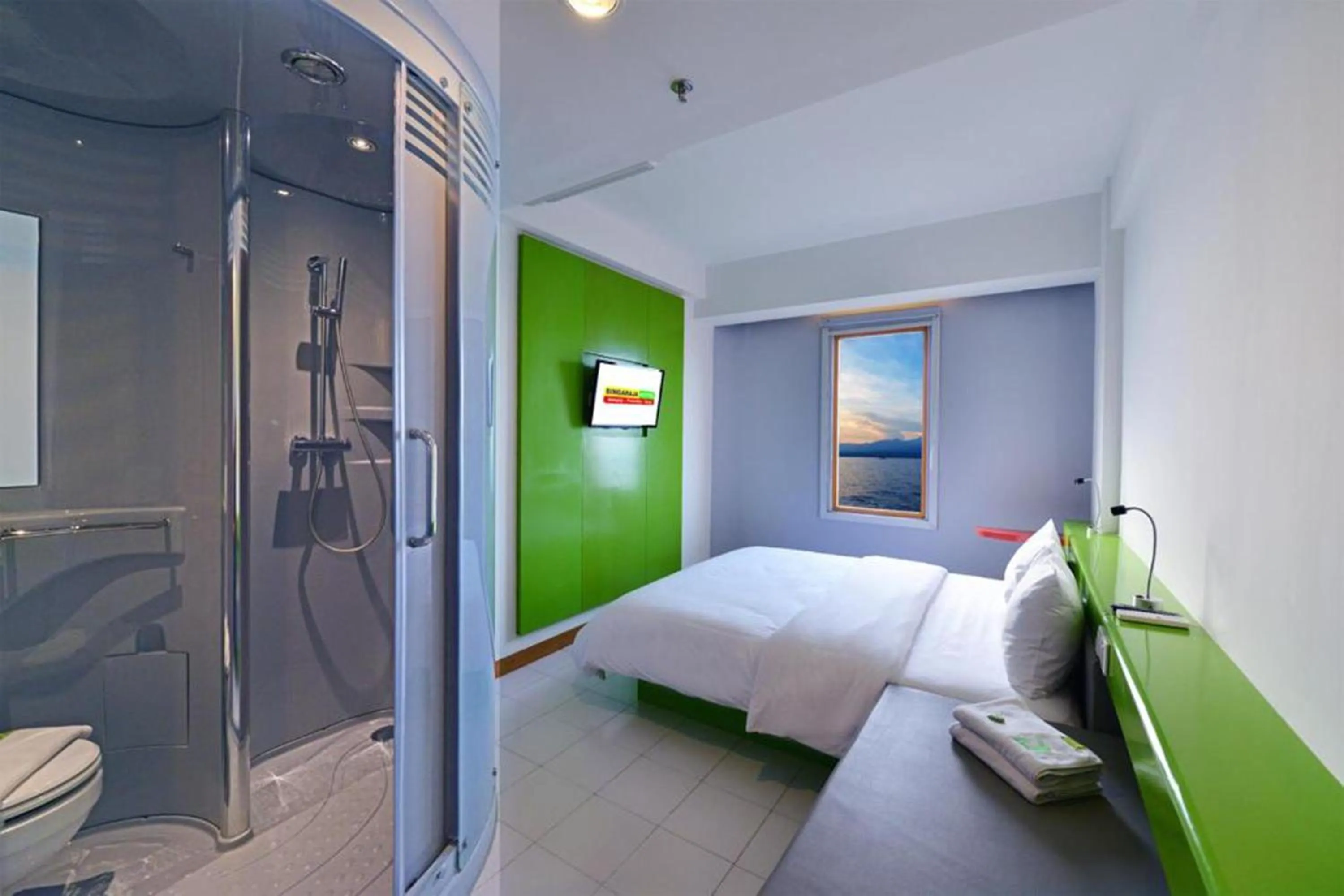 Photo of the whole room, Bed in Singaraja Beach Hotel