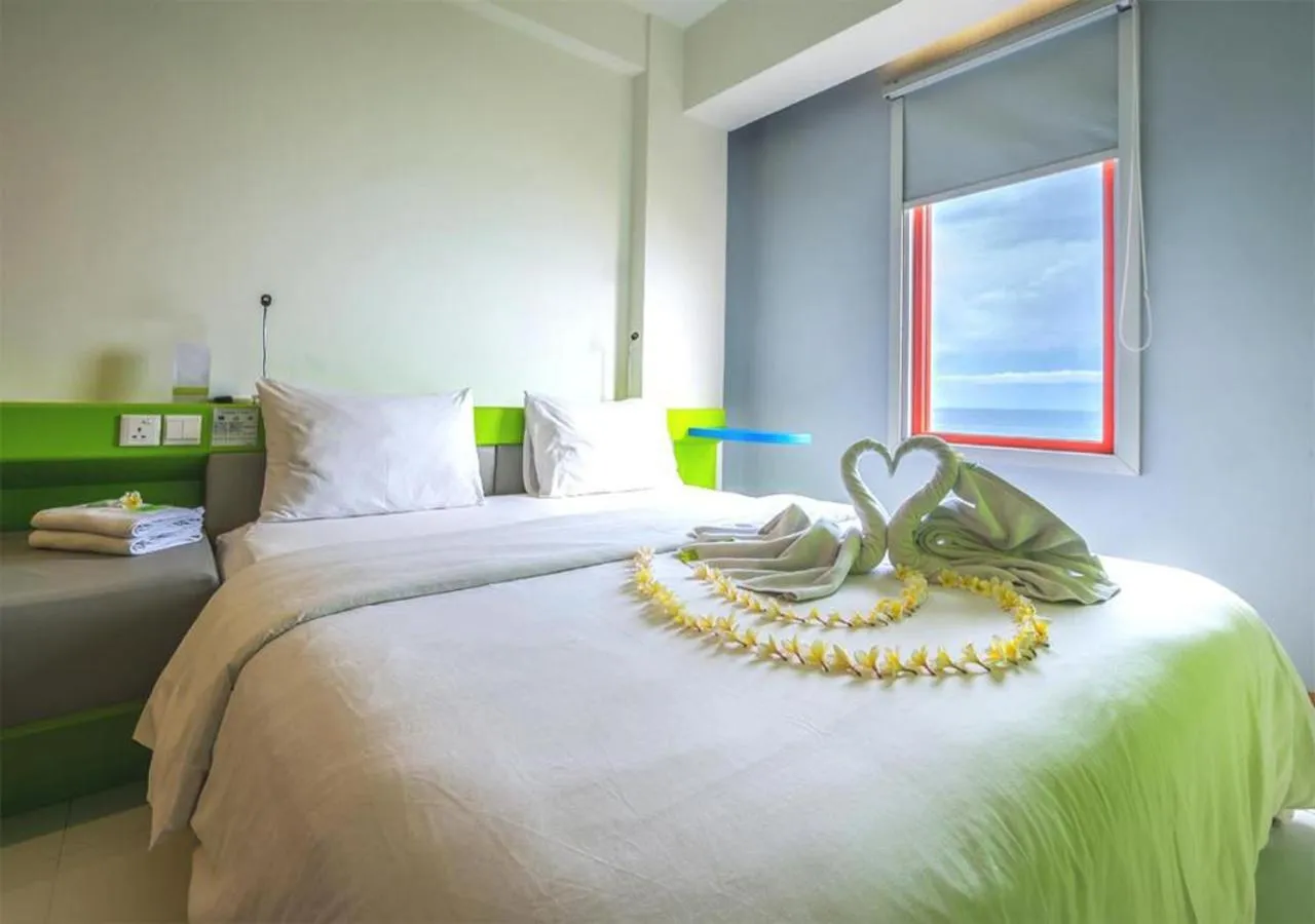 Bed in Singaraja Beach Hotel