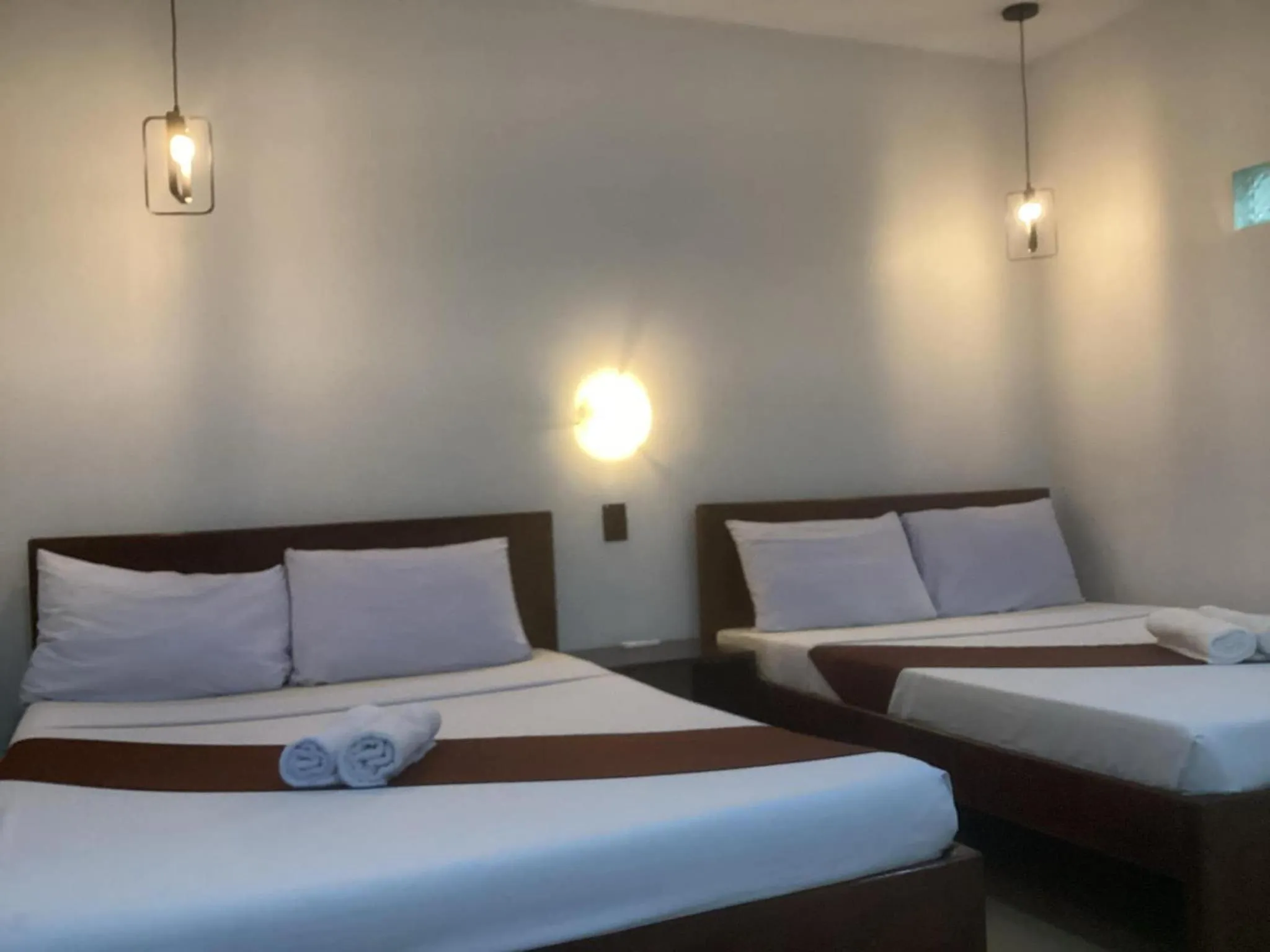 Bed in La Casa Teresa Tourist Inn Inc