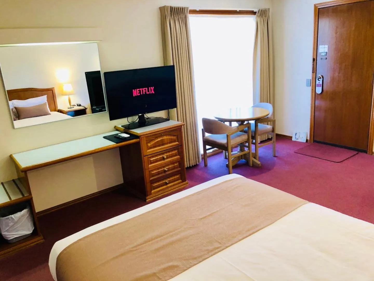 Bed in Victoriana Motor Inn