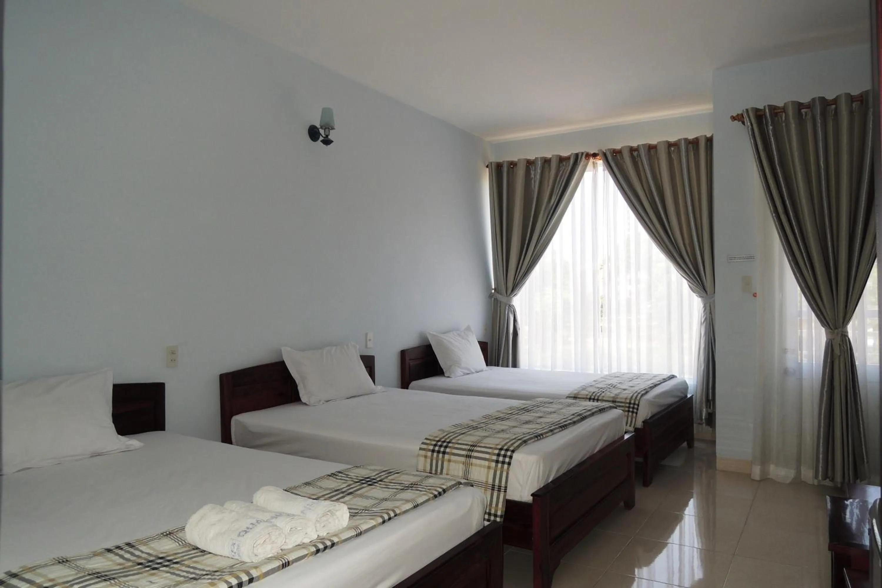 Photo of the whole room in Quang Nhat Hotel