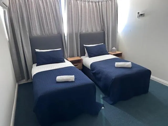 Bed in Warners Bay Hotel