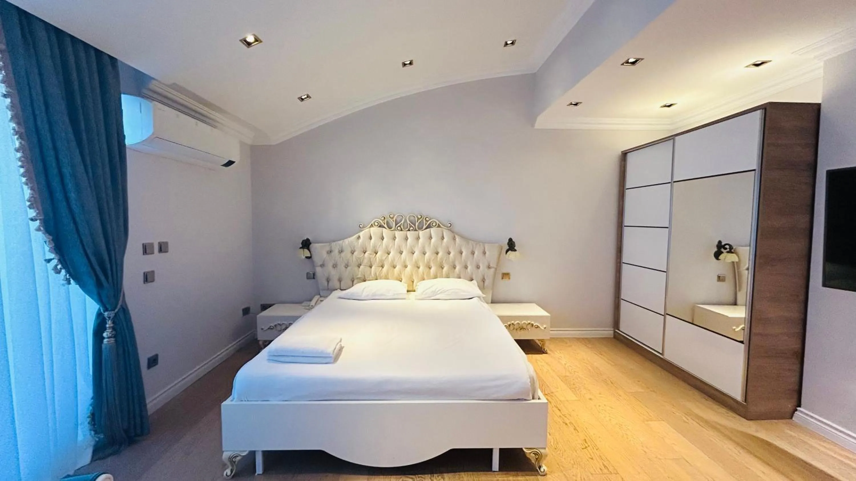 Bed in Onkel Rada Apart Hotel