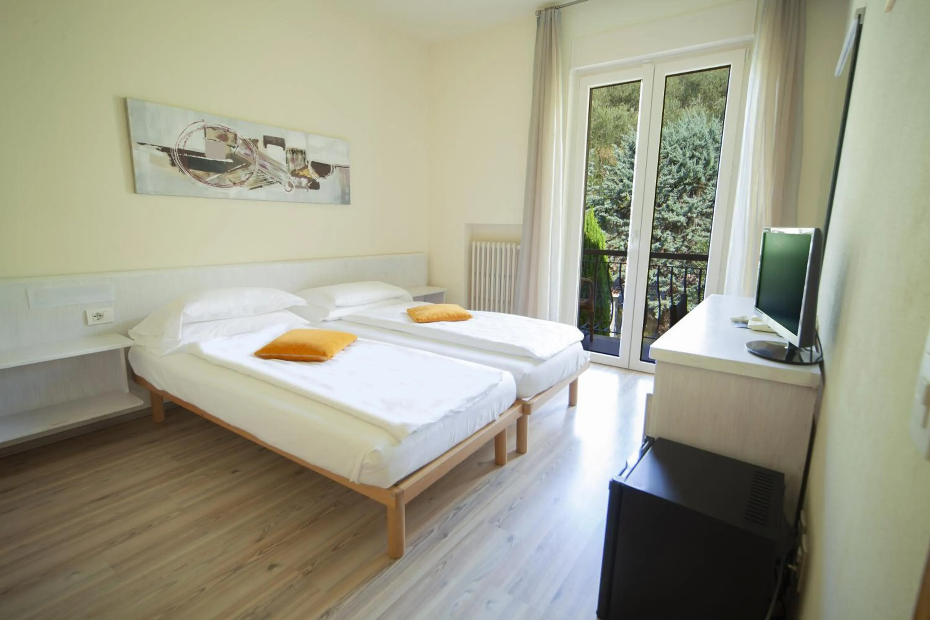 Photo of the whole room, Bed in Club Hotel Olivi - Tennis Center