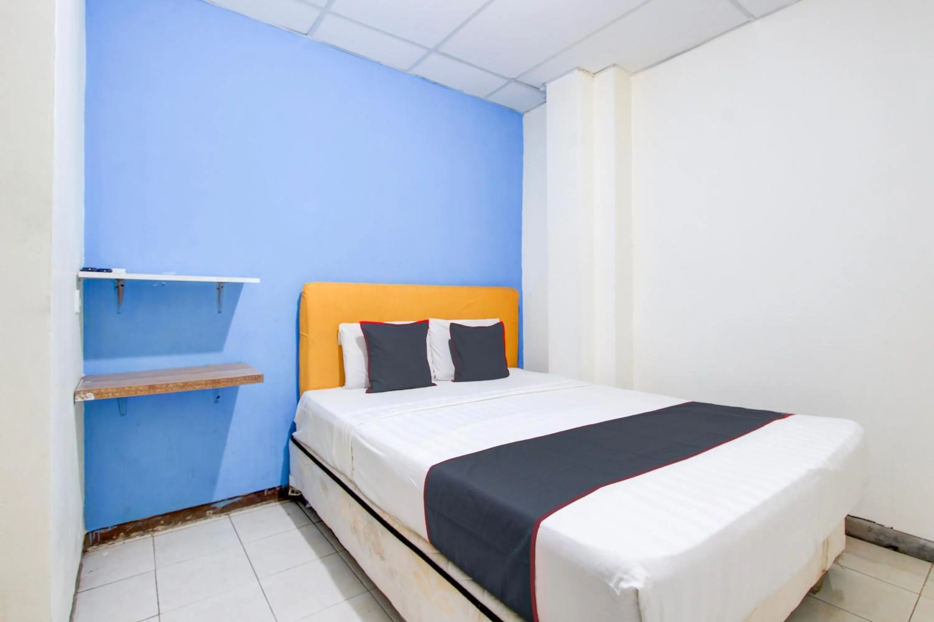 Bedroom in Hotel O Semarang near Kota Lama Semarang formerly Kamarkoe Residence