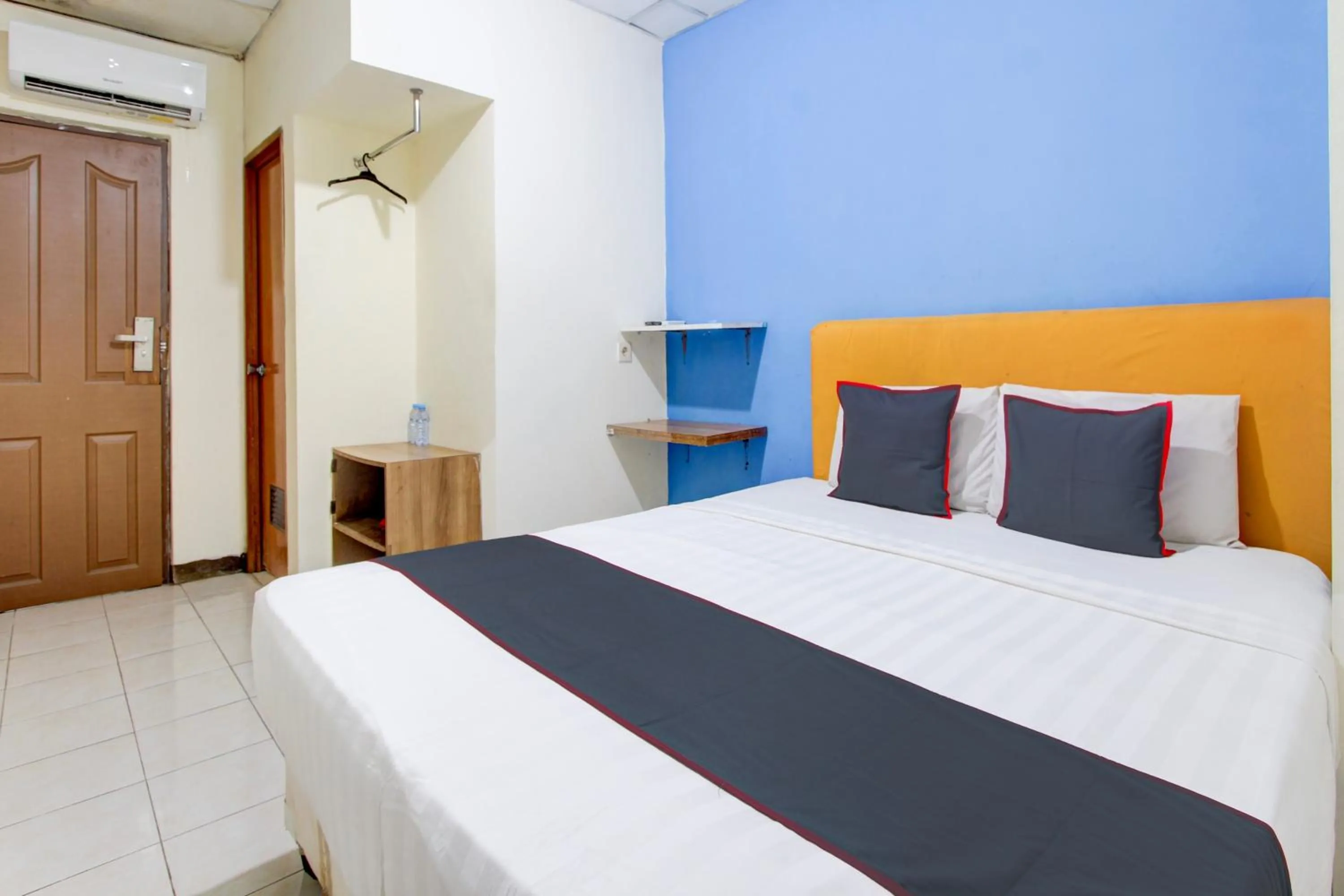 Bedroom in Hotel O Semarang near Kota Lama Semarang formerly Kamarkoe Residence