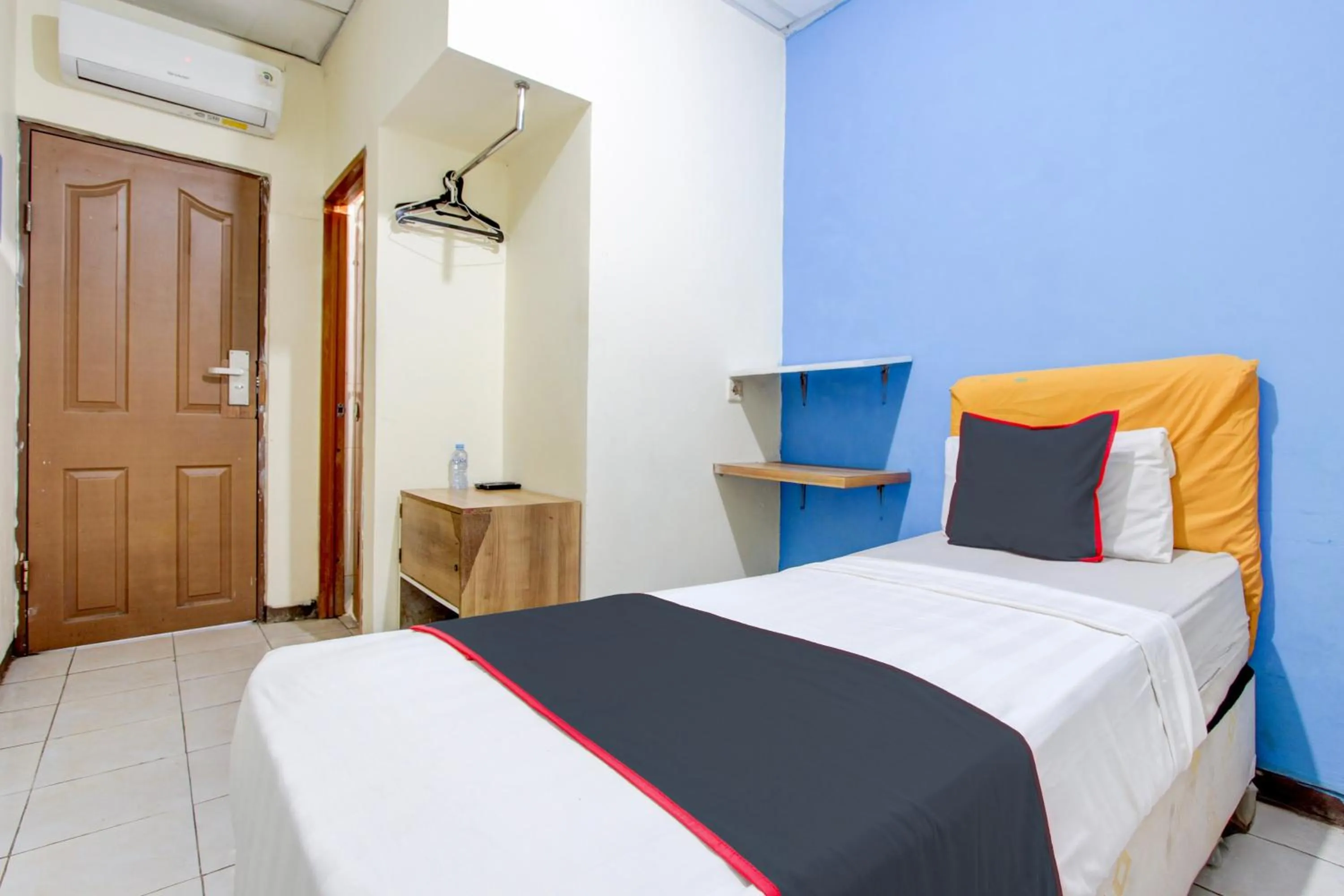 Bedroom in Hotel O Semarang near Kota Lama Semarang formerly Kamarkoe Residence