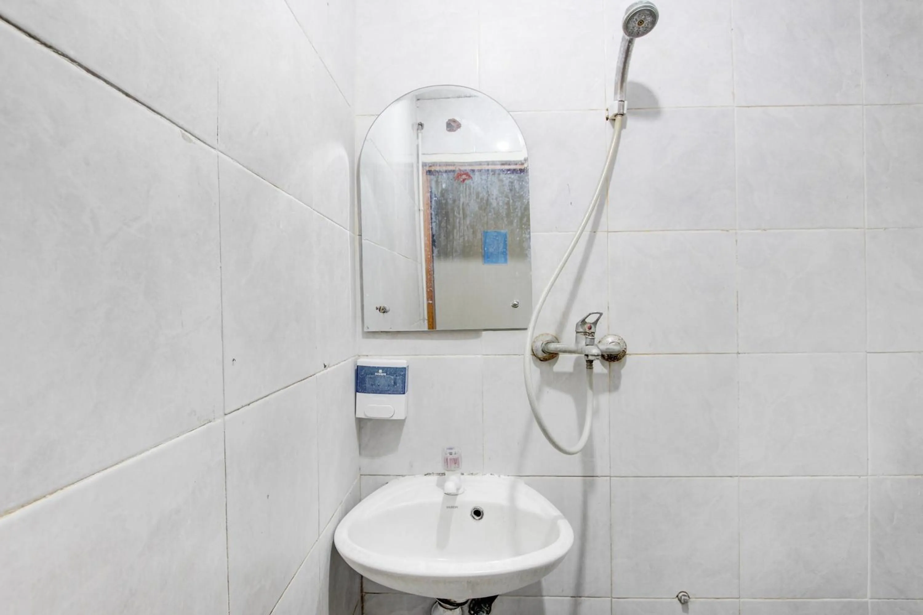 Bathroom in Hotel O Semarang near Kota Lama Semarang formerly Kamarkoe Residence