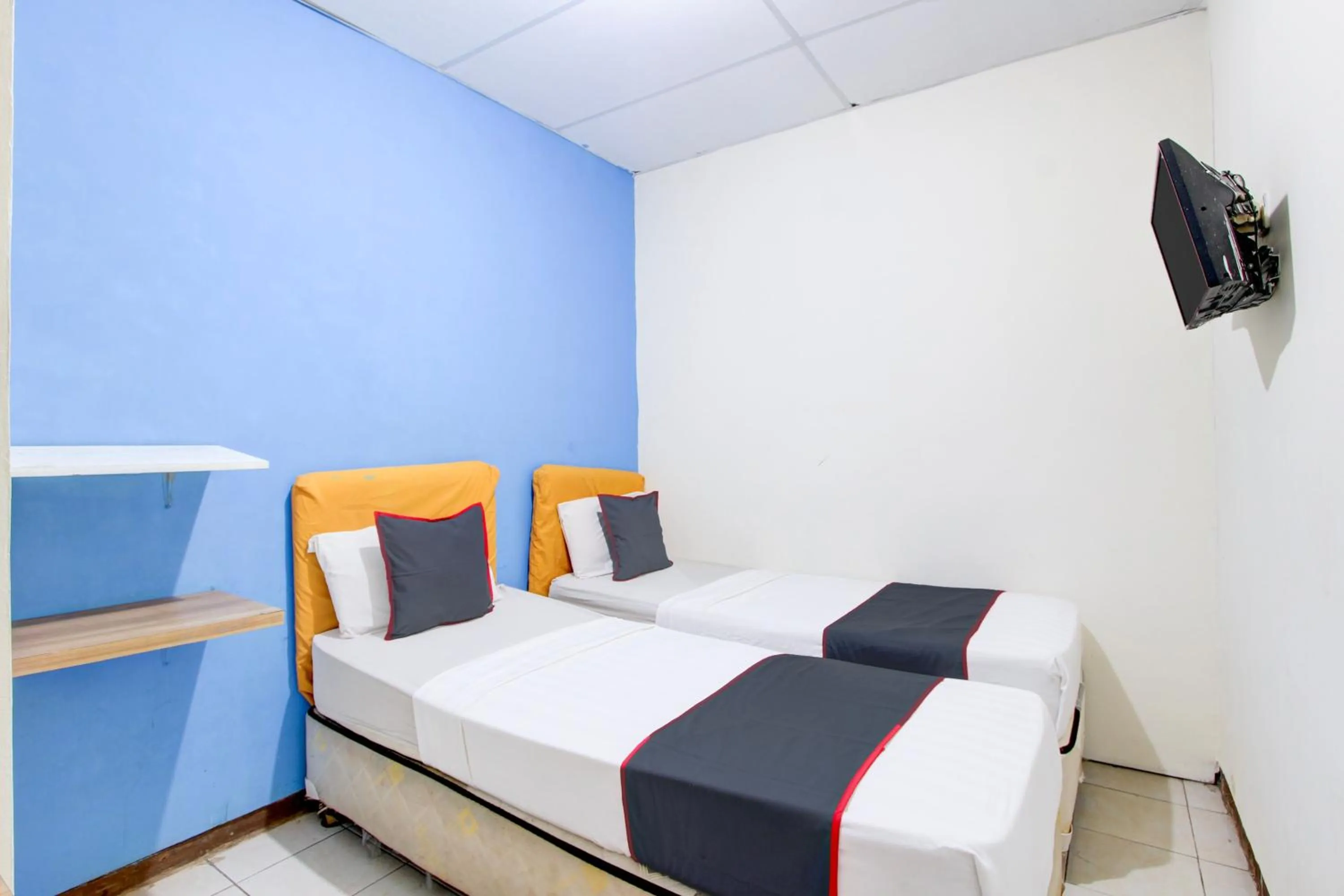 Bedroom in Hotel O Semarang near Kota Lama Semarang formerly Kamarkoe Residence