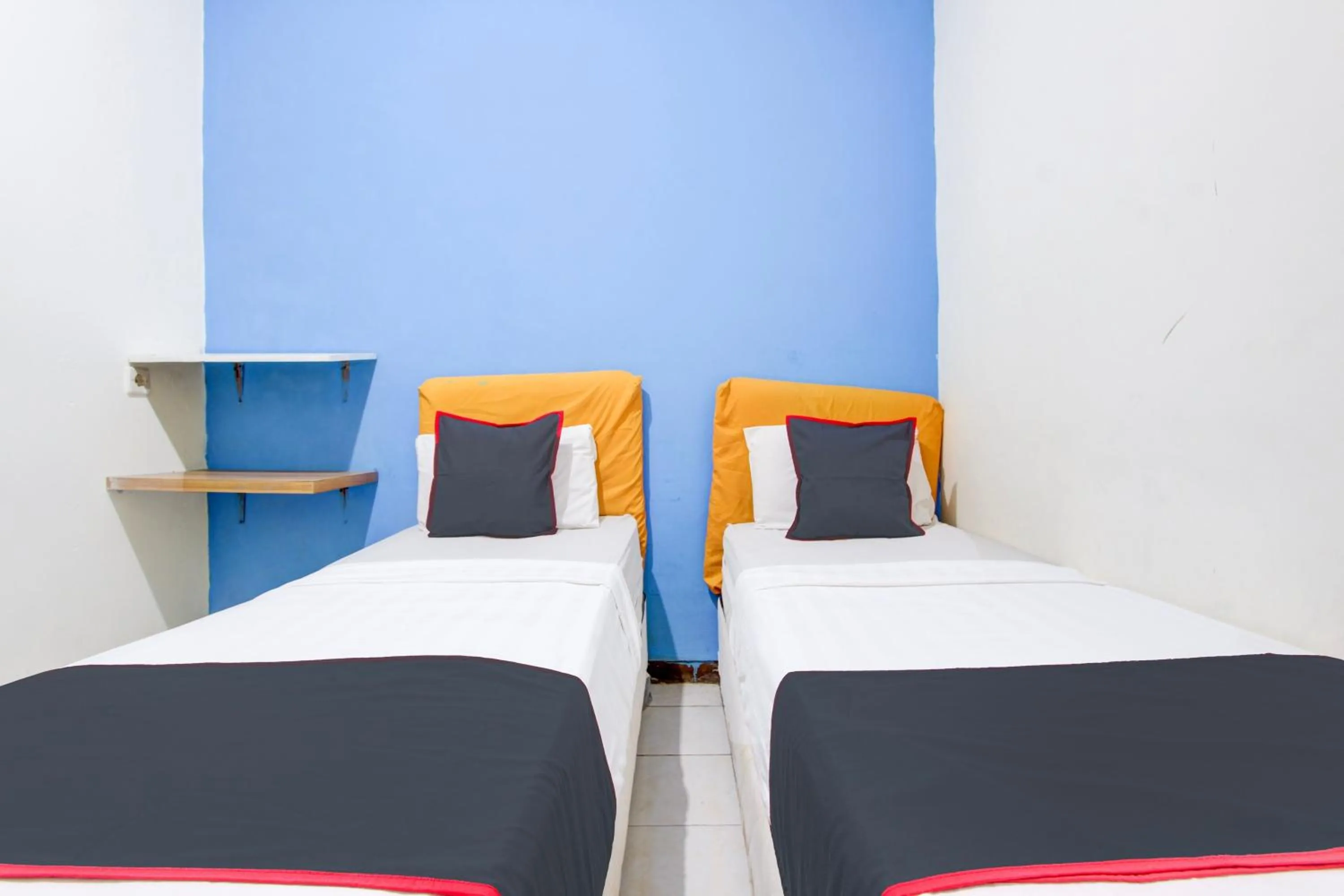 Bedroom in Hotel O Semarang near Kota Lama Semarang formerly Kamarkoe Residence