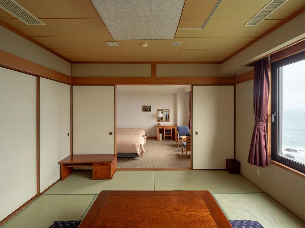 Bed in THE HOTEL YAKUSHIMA ocean & forest