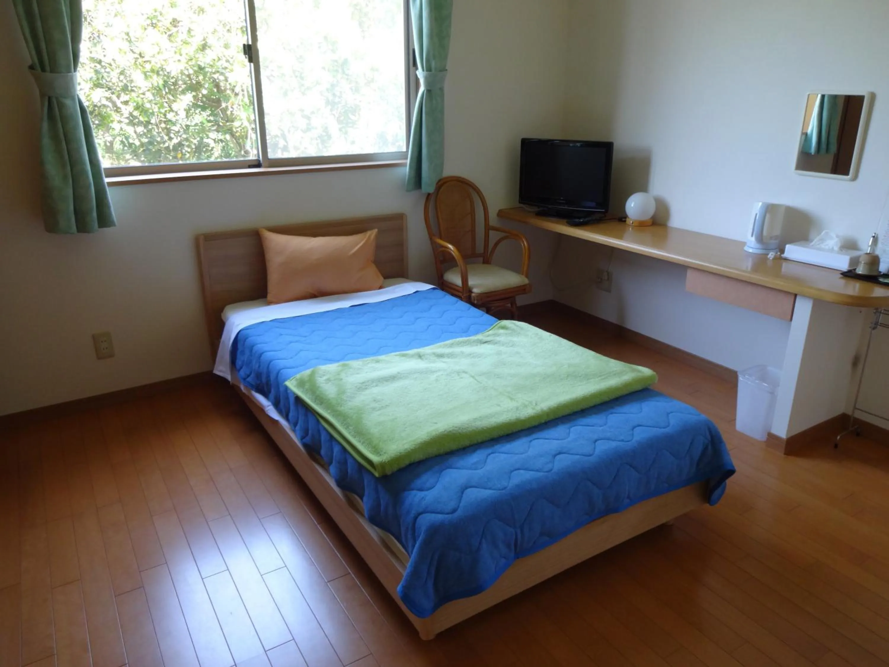 Photo of the whole room, Bed in Mantenbo