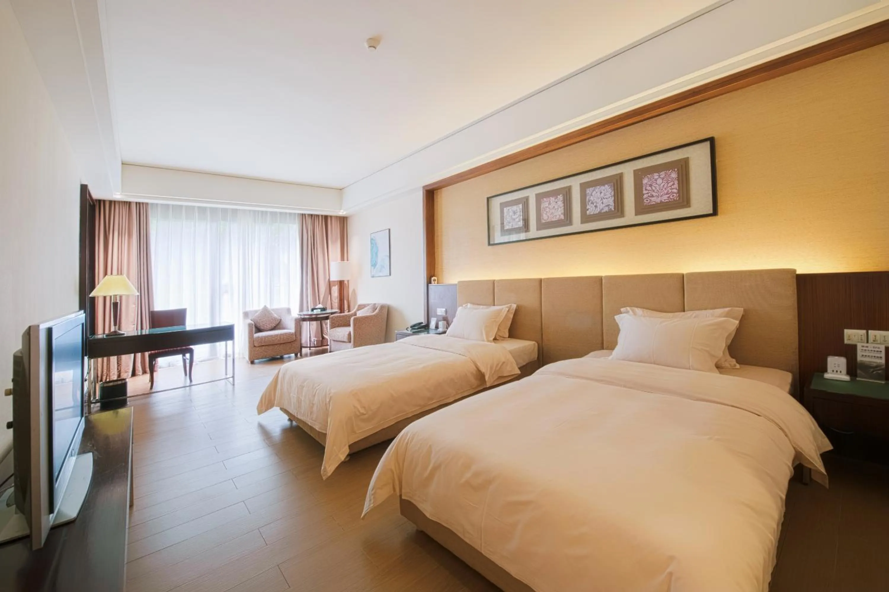 Bed in Dongguan Richwood Garden Hotel