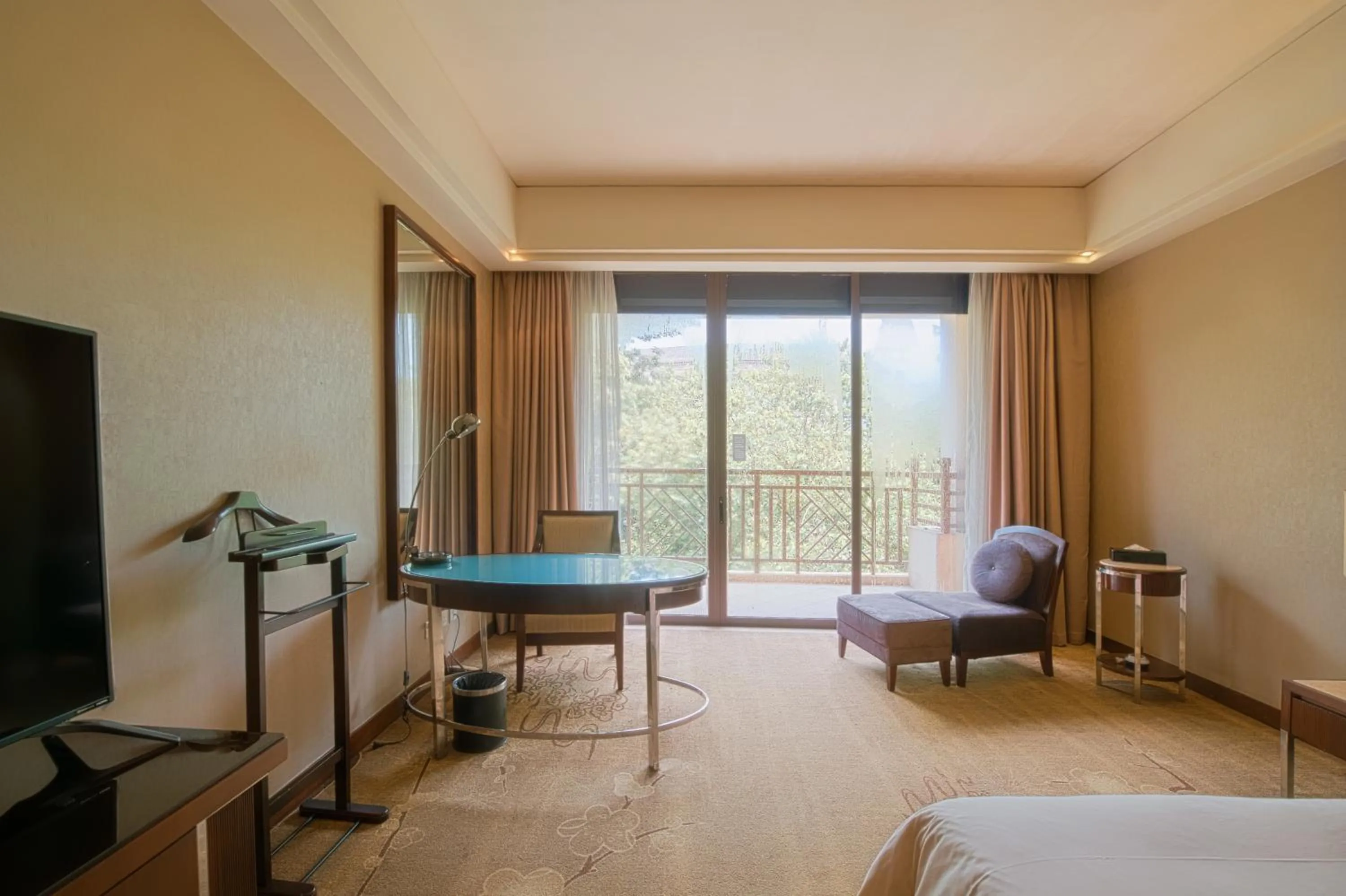 Bed in Dongguan Richwood Garden Hotel