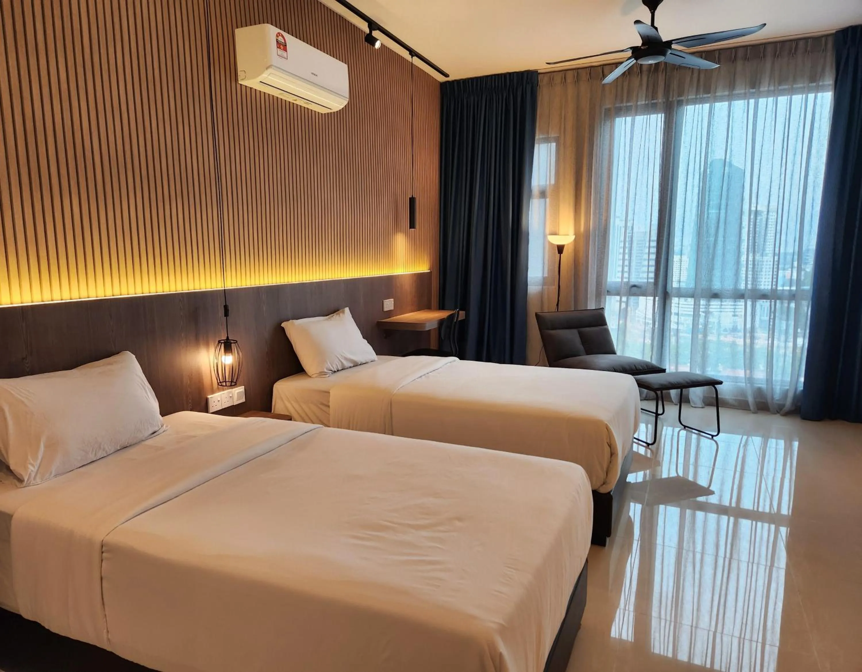 Bed in SKS Pavillion Suites