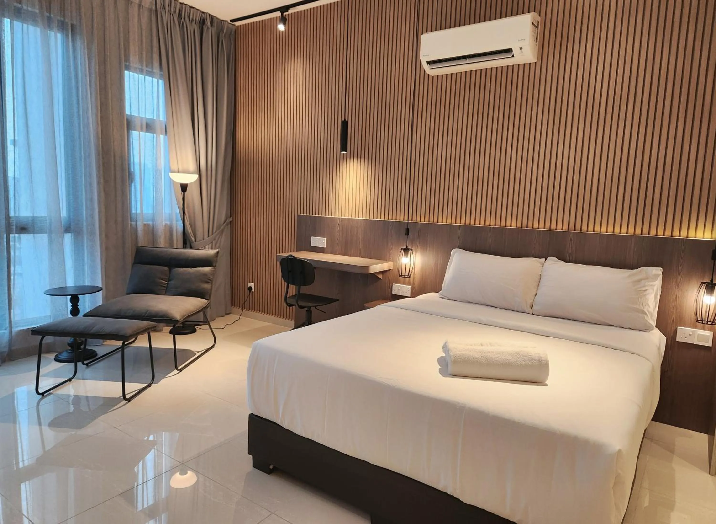 Bed in SKS Pavillion Suites