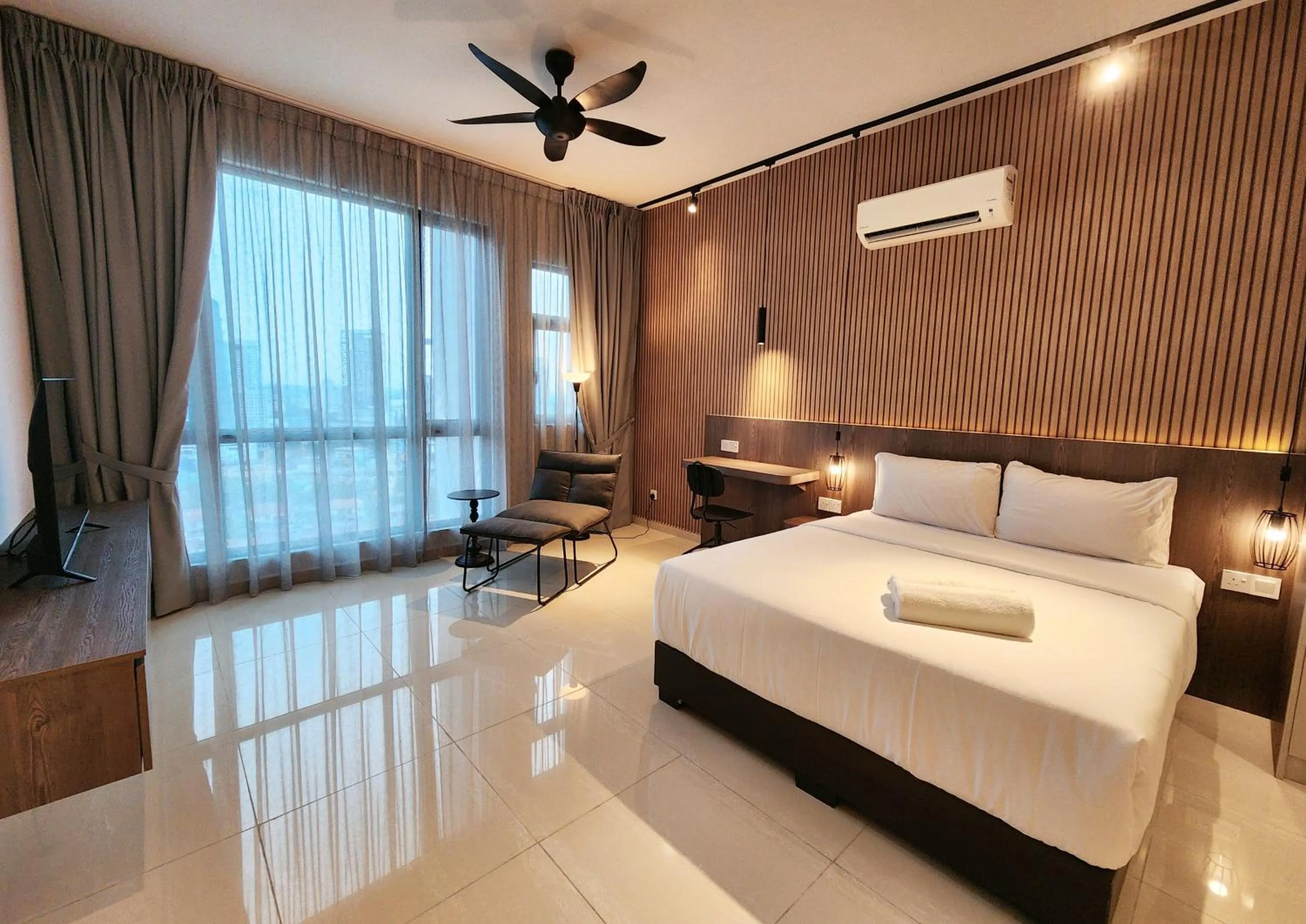 Bed in SKS Pavillion Suites