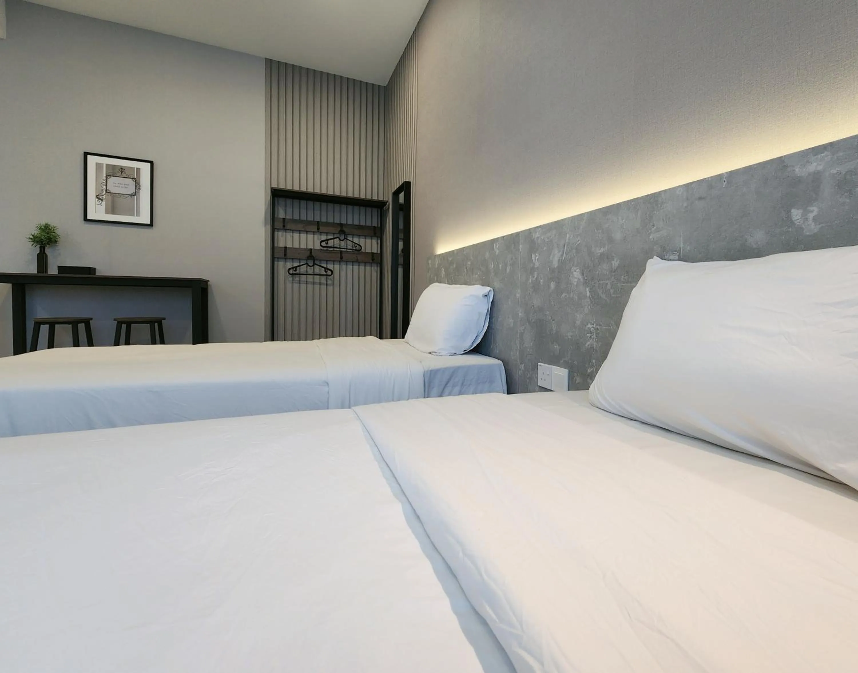 Bed in SKS Pavillion Suites