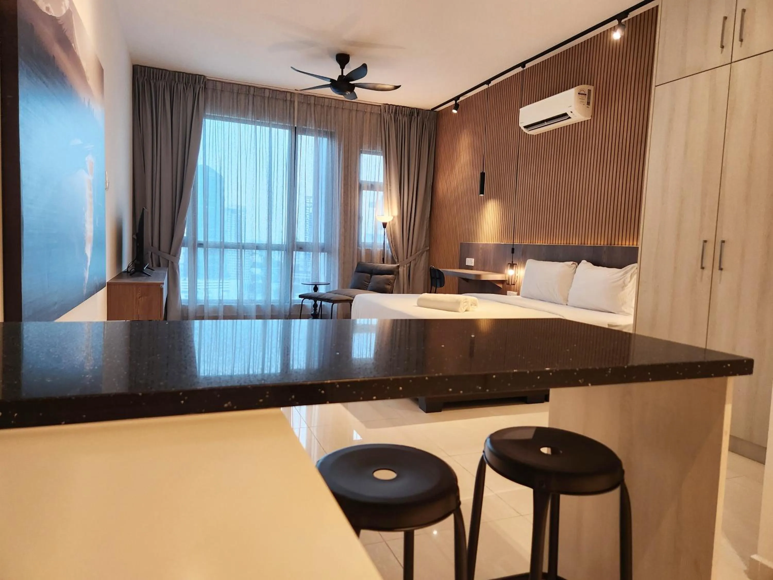 Bed in SKS Pavillion Suites