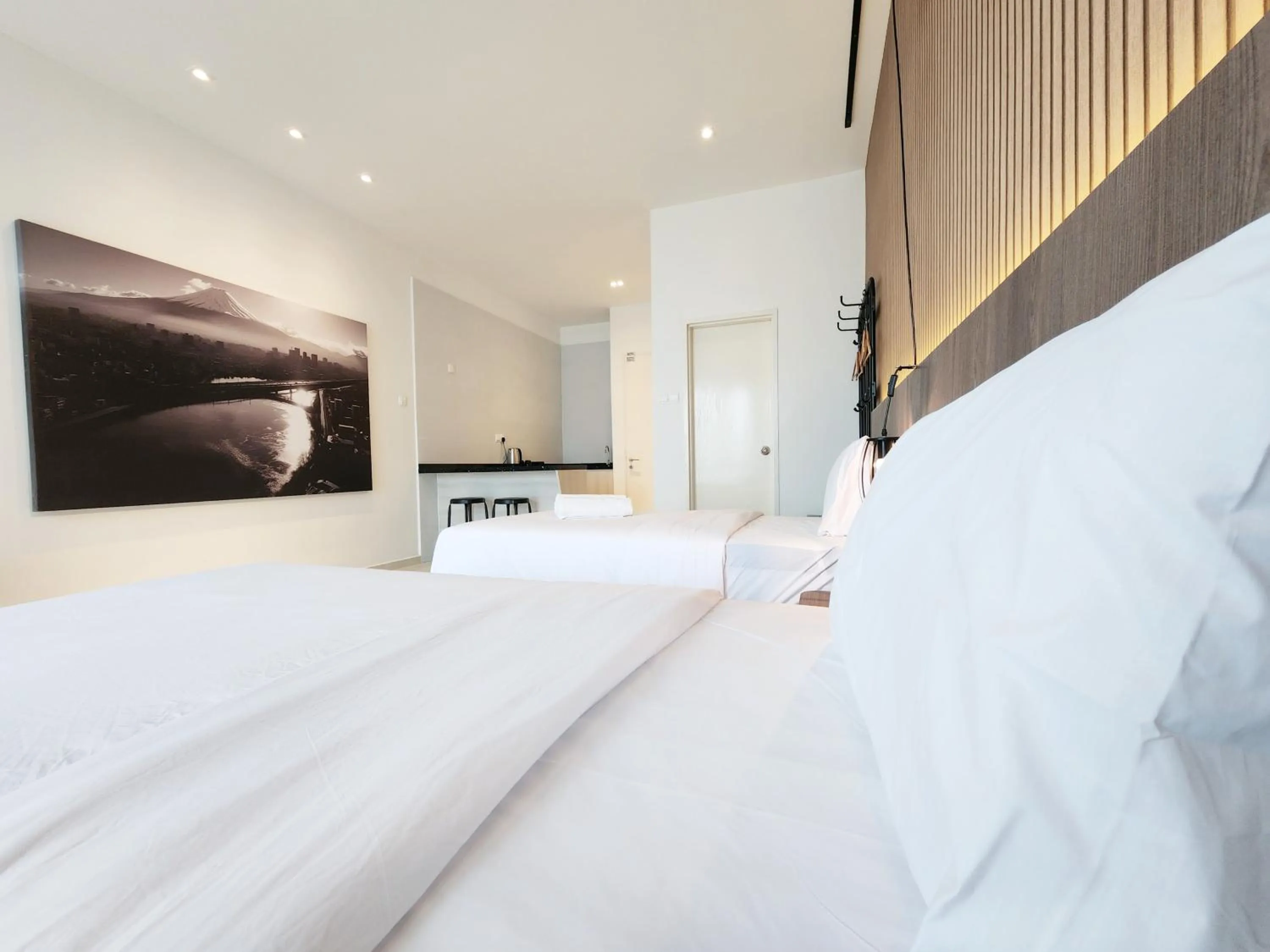 Bed in SKS Pavillion Suites