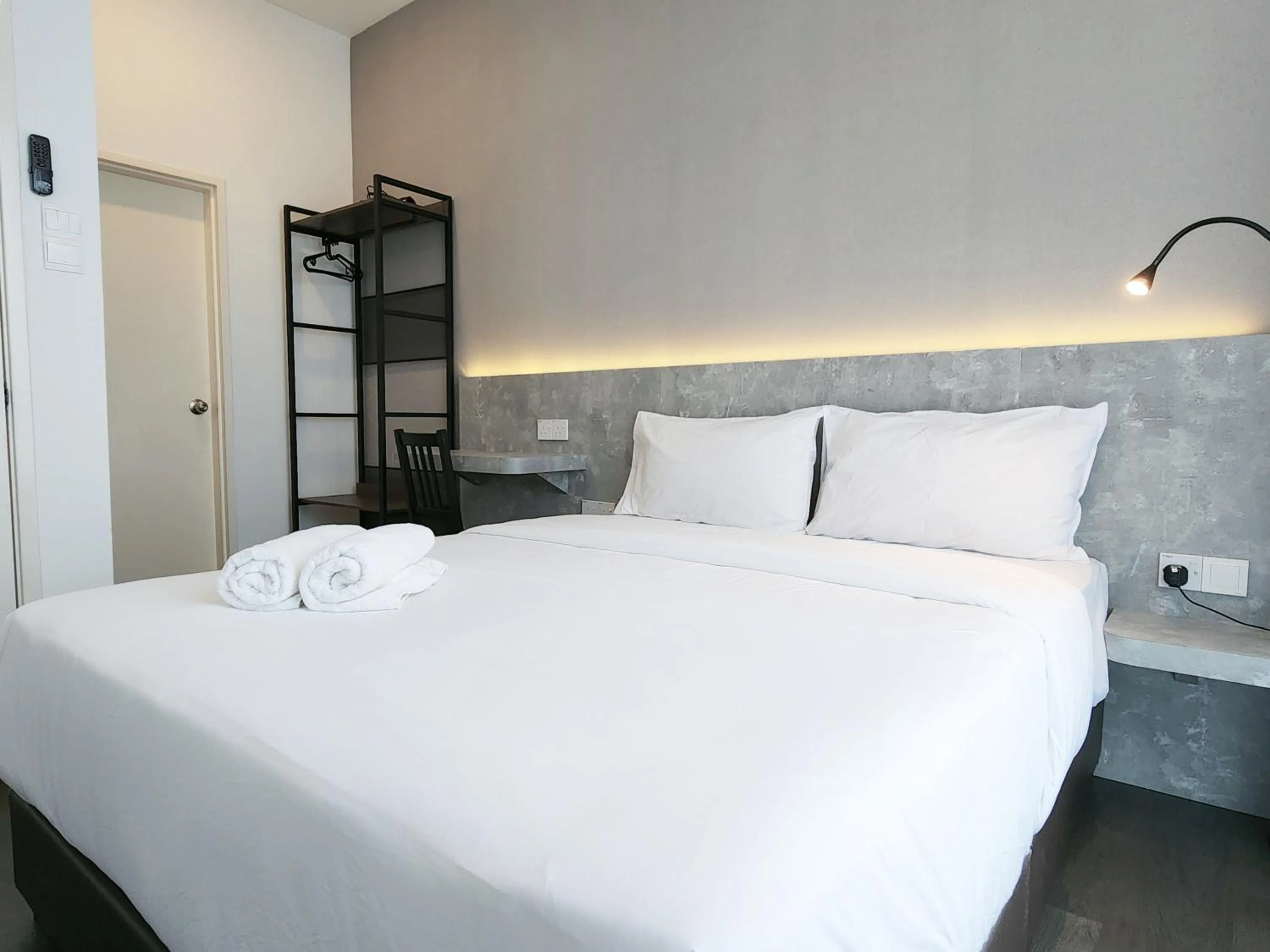 Bed in SKS Pavillion Suites