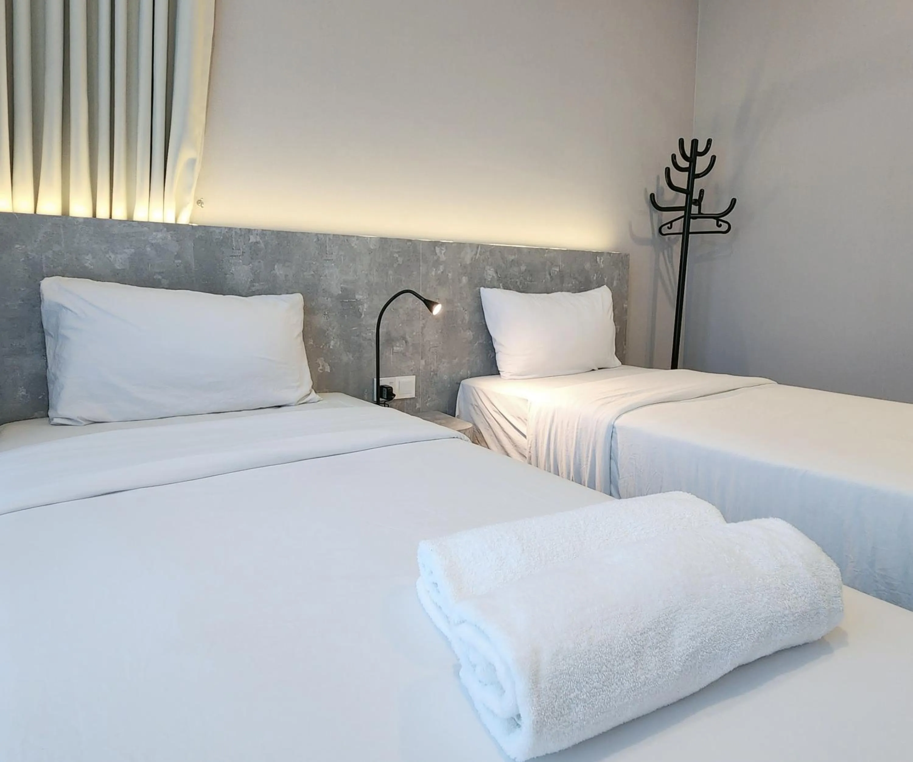 Bed in SKS Pavillion Suites