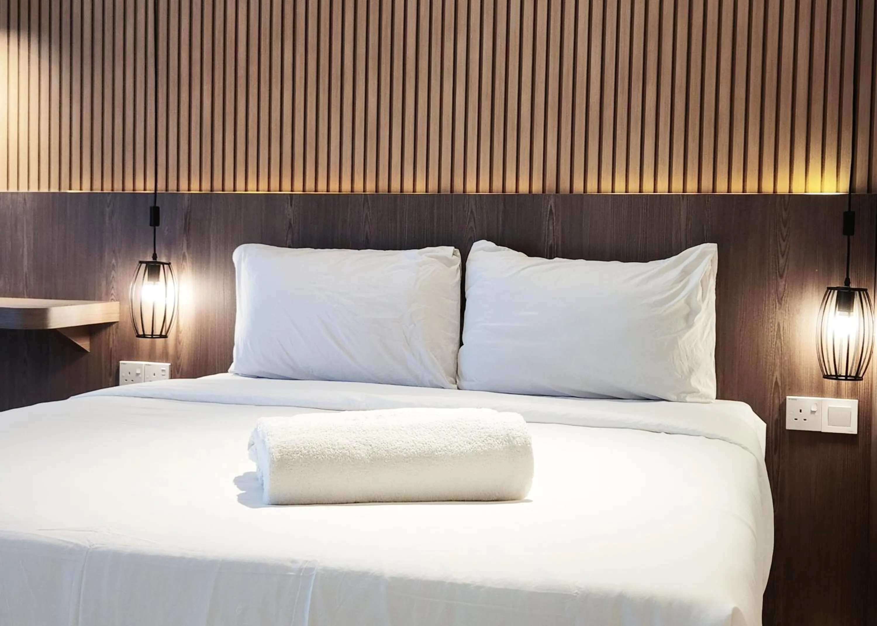 Bed in SKS Pavillion Suites