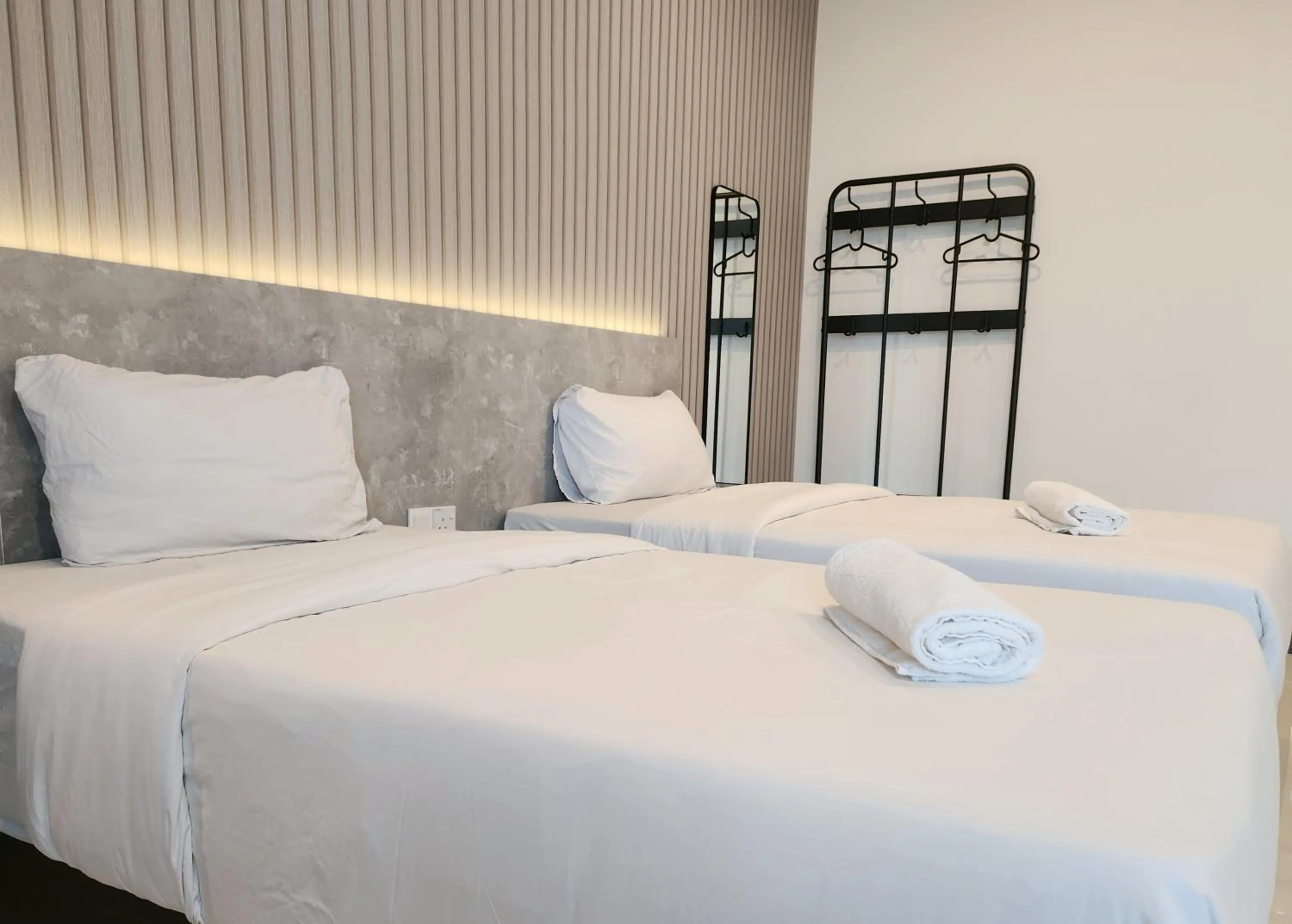 Bed in SKS Pavillion Suites