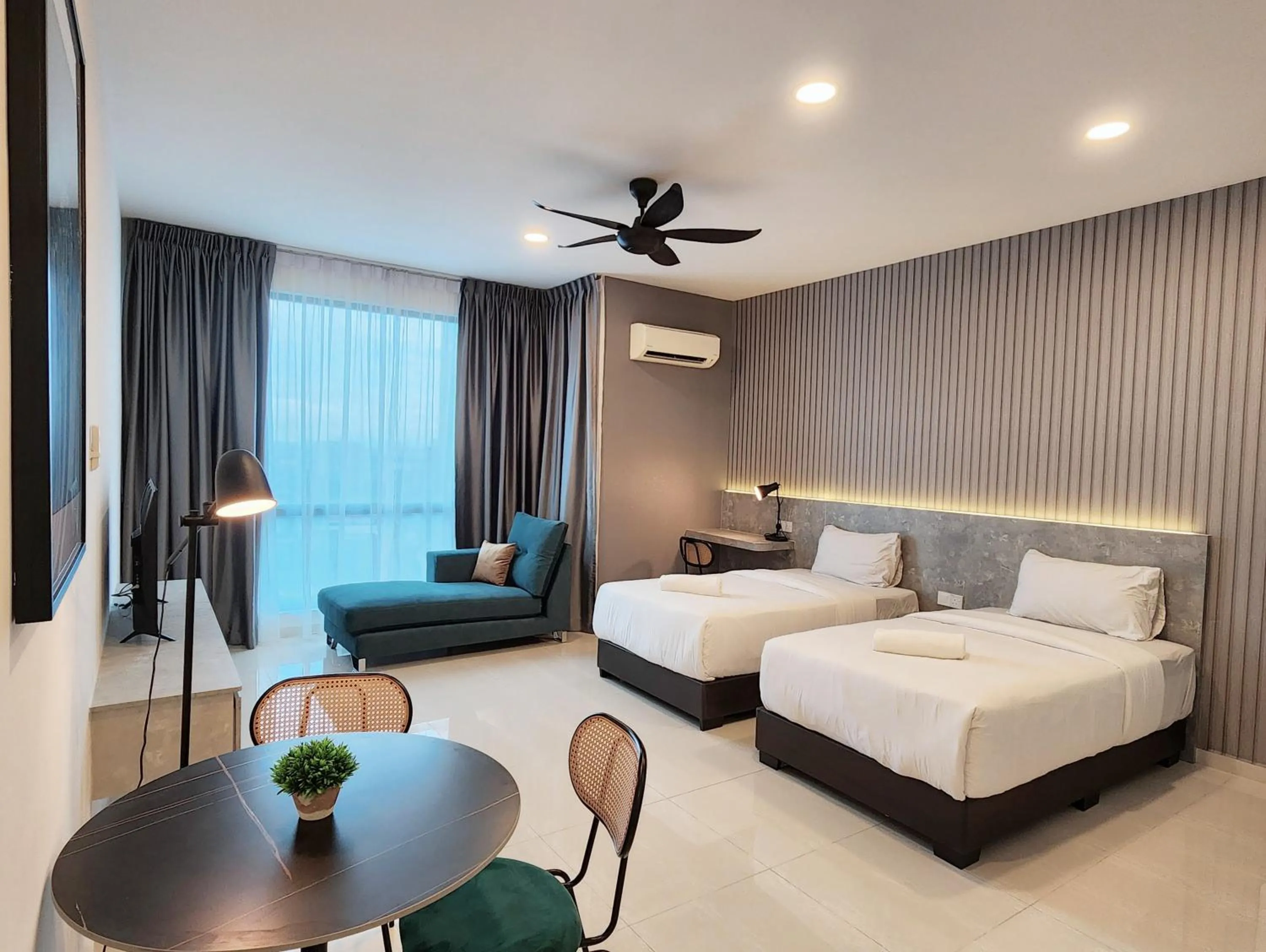 Bed in SKS Pavillion Suites